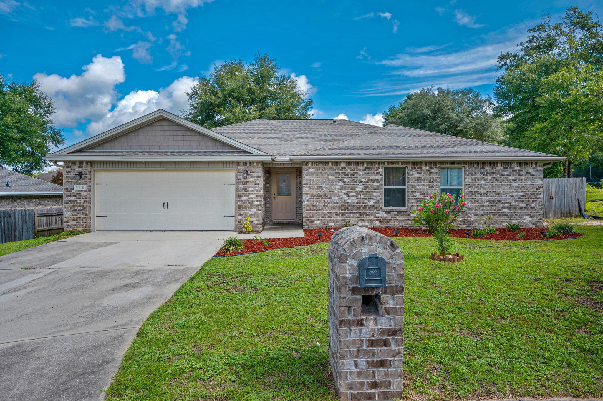 Great 4/2 floor plan in Trailwood Estates. . Centrally located in Crestview with easy access to both 85 and 90.  Wood accent wall and trim stand out in this stunning home! Custom shelving and other design touches make this one a Wow, Wow, WOW!
Treyed ceilings and an open living area make for an extremely spacious feel. Vinyl flooring in the living area and master, tile in the kitchen and bath provide for a durable and easy to maintain home. 
Open back patio for your grill and seating area.  
Located in a cul-de-sac on a level lot!  Come see this one today!