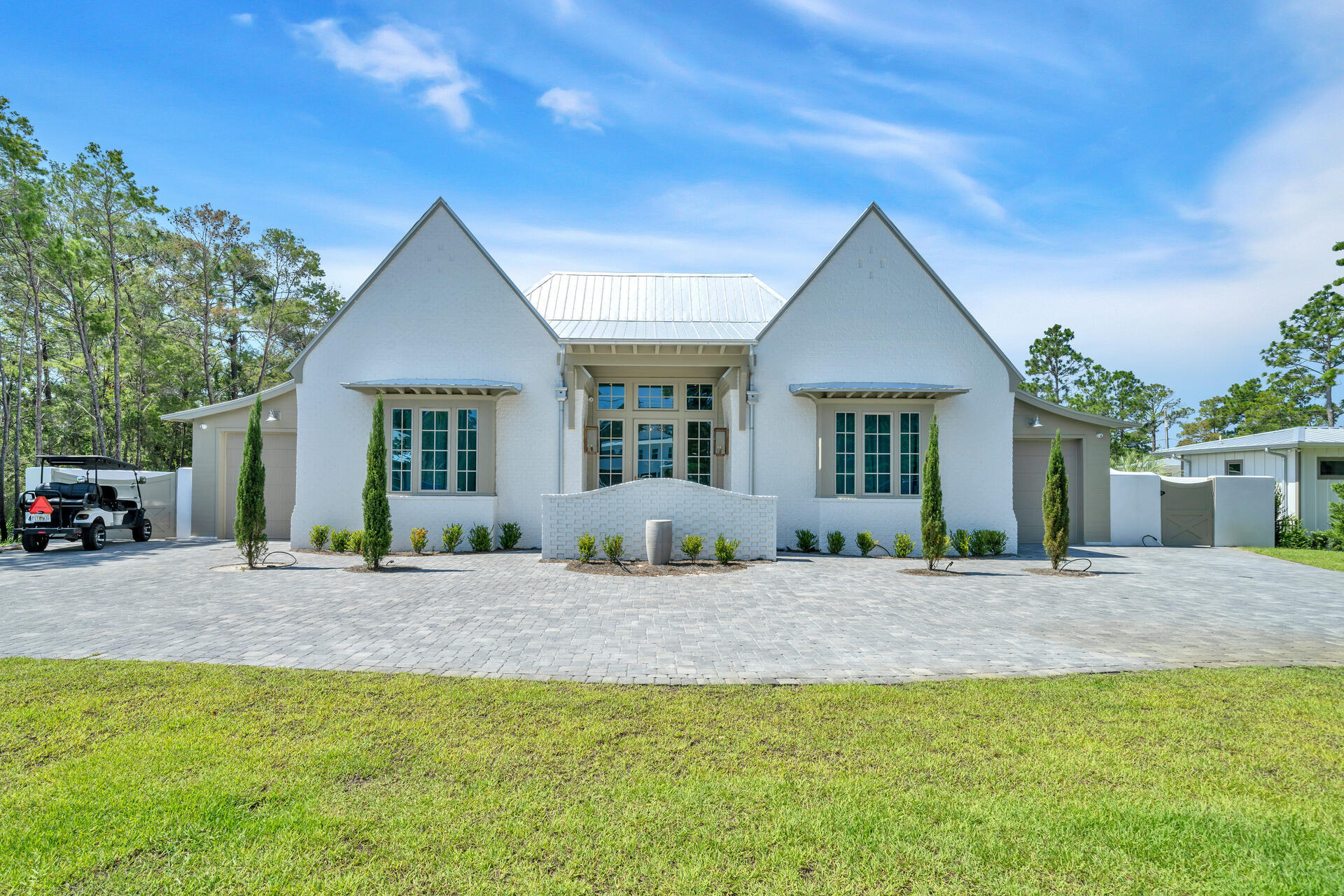 NOTHING SHORT OF STUNNING - secluded neighborhood backing up to the national forest with majority full-time residents-NO HOA. PICKLEBALL COURT with NBA style basketball goals complete with sport court. Rare Gem at every turn...one of 30A's largest single family inground pools, large shallow and deep end, encompassed by the most amazing garden, certain to whisk you away to a French Countryside. Garden design and construction by world renowned gardener along with the most adorable greenhouse. Interior is nothing short of breathtaking with high-end custom finishes and designer details. All 5 bedrooms are on first level. Bathroom in all 5 bedrooms with two rooms situated as a jack-n-jill. Two Full size garages. Home is fully stocked with so much storage (inside and for outside toys).  Second level is sure to impress with 4 built in bunk beds and large living room with an added surprise space along with loads of unlimited climate-controlled storage.