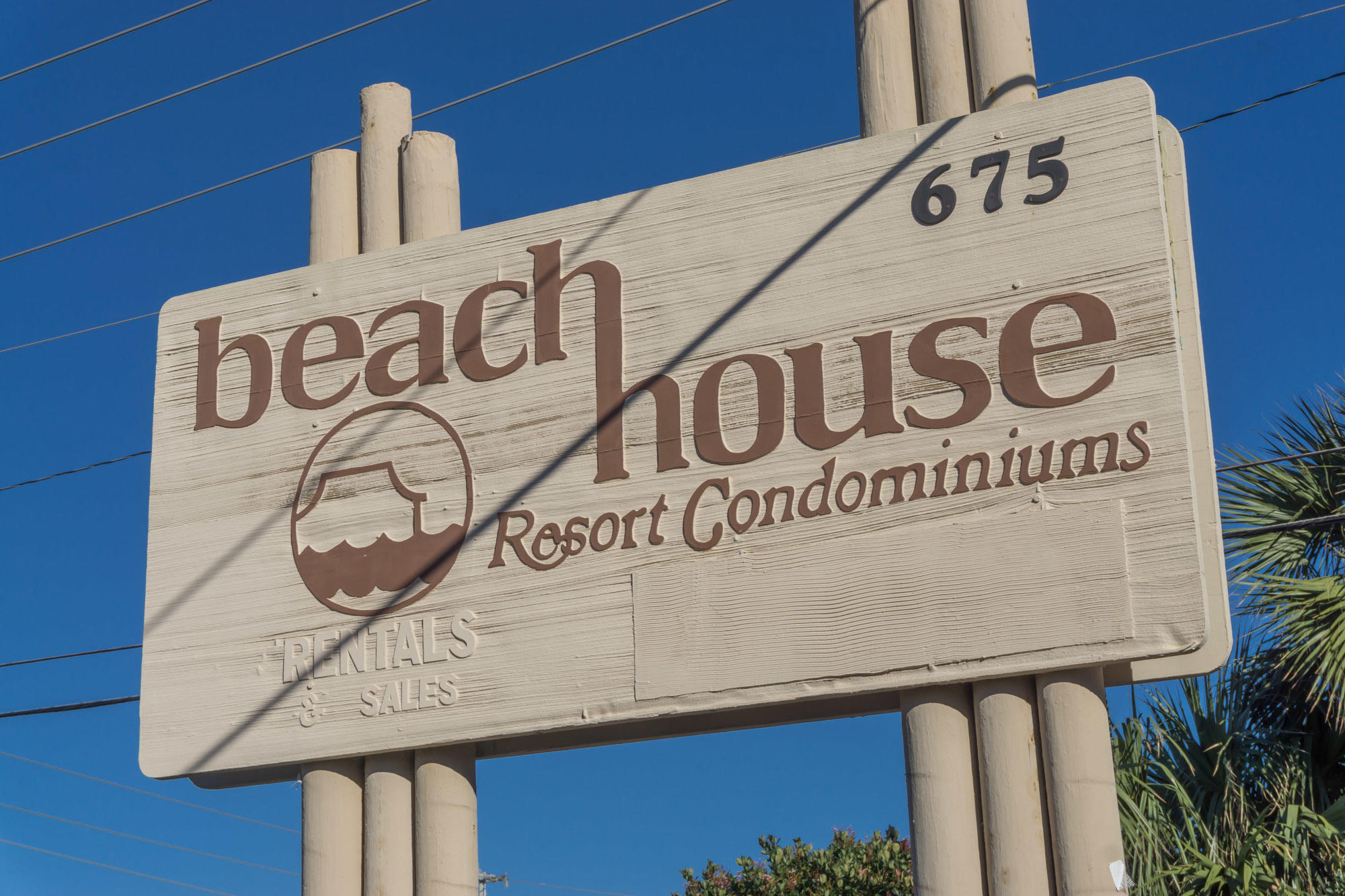 The only 2 bedroom unit available in Beach House. This unit is in an excellent location on the 5th floor overlooking the pool. This unit has tile and Crown Molding throughout. Living area has mirrored wall that enhance the brightness of the unit. The stainless appliances have recently been replaced and a washer and dryer has been added. New shower in Master bath with new cabinet.
