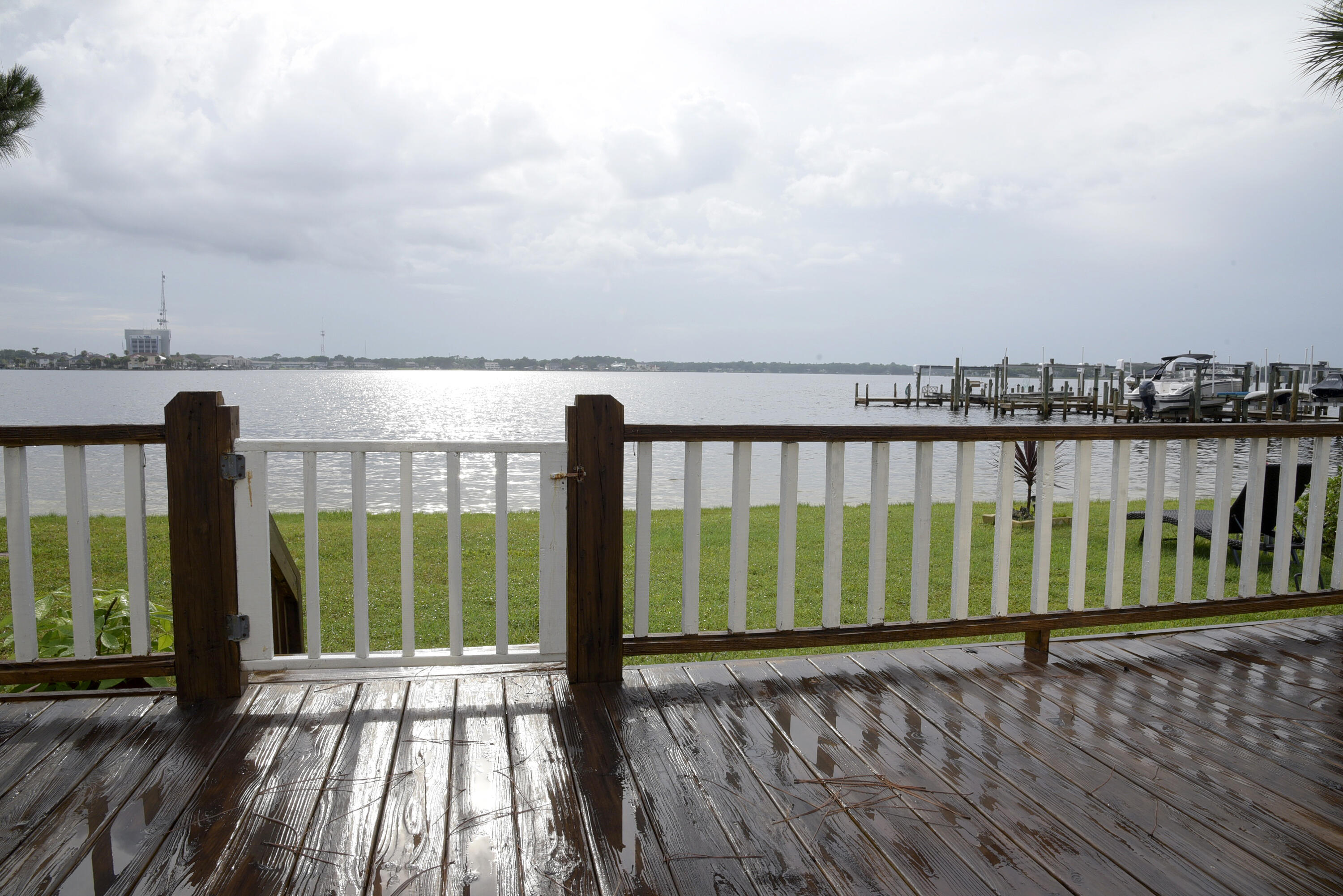 Stunning views of the Bay from this 2/2 gorgeous townhome! You feel as though you are cantilevering over the water as you take in the view from the wall of sliding doors in the main living area of the unit. Updated kitchen with solid surface counter tops, stainless appliances & large island. There is even a washer & dryer (not warranted) provided! Spacious master suite and guest bedrooms offer views and privacy. Deck outback offers serene views of the bay. Owner will consider a SMALL dog only! Any dog will have to be current on all shots, housebroken & spayed/neutered. A non-refundable pet fee is required. NO SMOKING! Any person 18 years or older must complete separate applications. Tenants required to carry renter's liability insurance