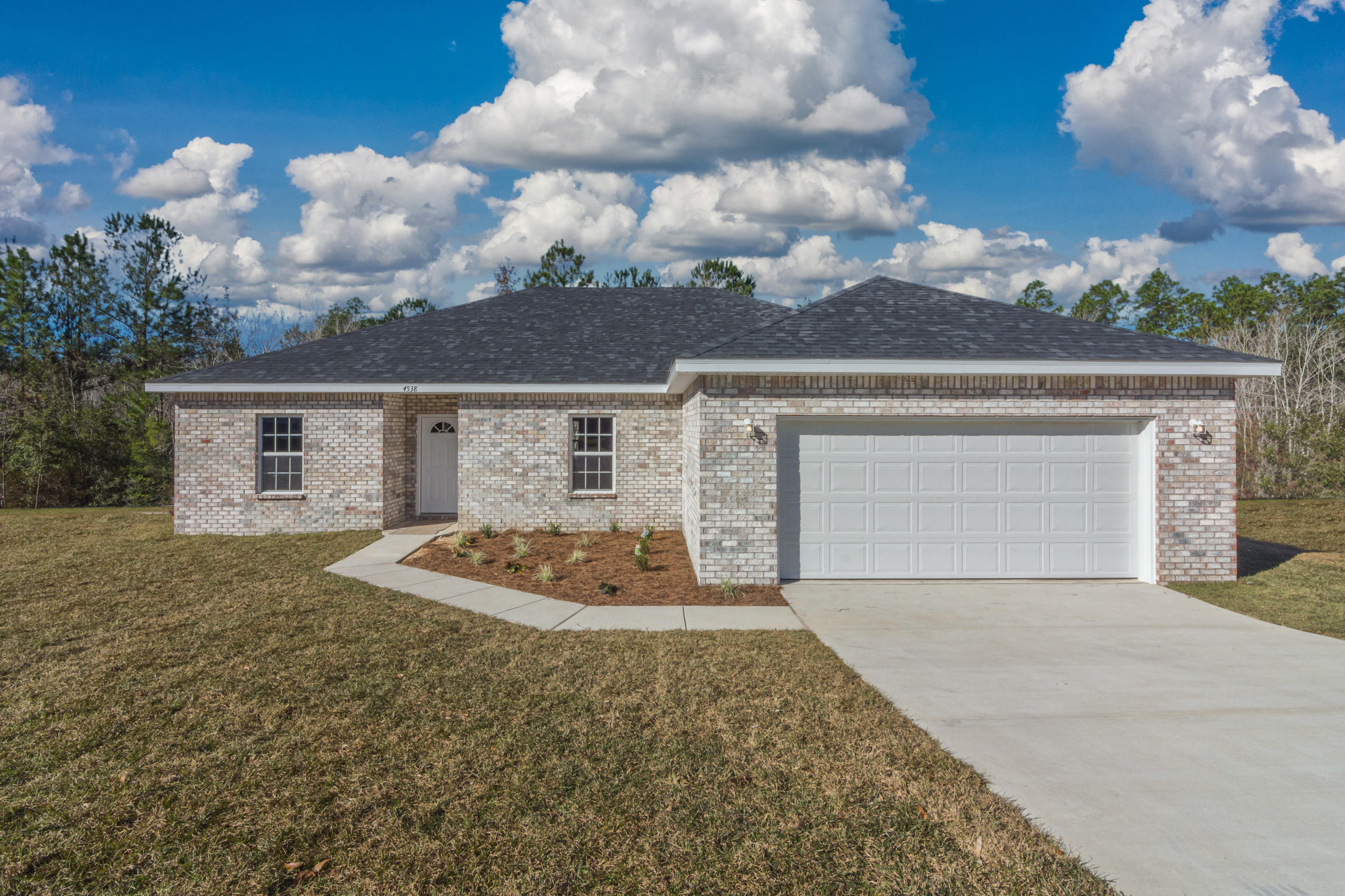 LOCATION LOCATION LOCATION!!! To be built with contract. Brand new construction 4 bedroom 2 bath, Brick siding with with tile in the kitchen and baths. This house has carpet in the bedrooms. Granite is an upgrade. An affordable home you can be proud of that sits south of I-10, letting you avoid the Crestview traffic snarls. Approximately 10 minutes to 7th Special Forces & Duke Field and 15 minutes to Eglin AFB. Very close to grocery stores & restaurants.