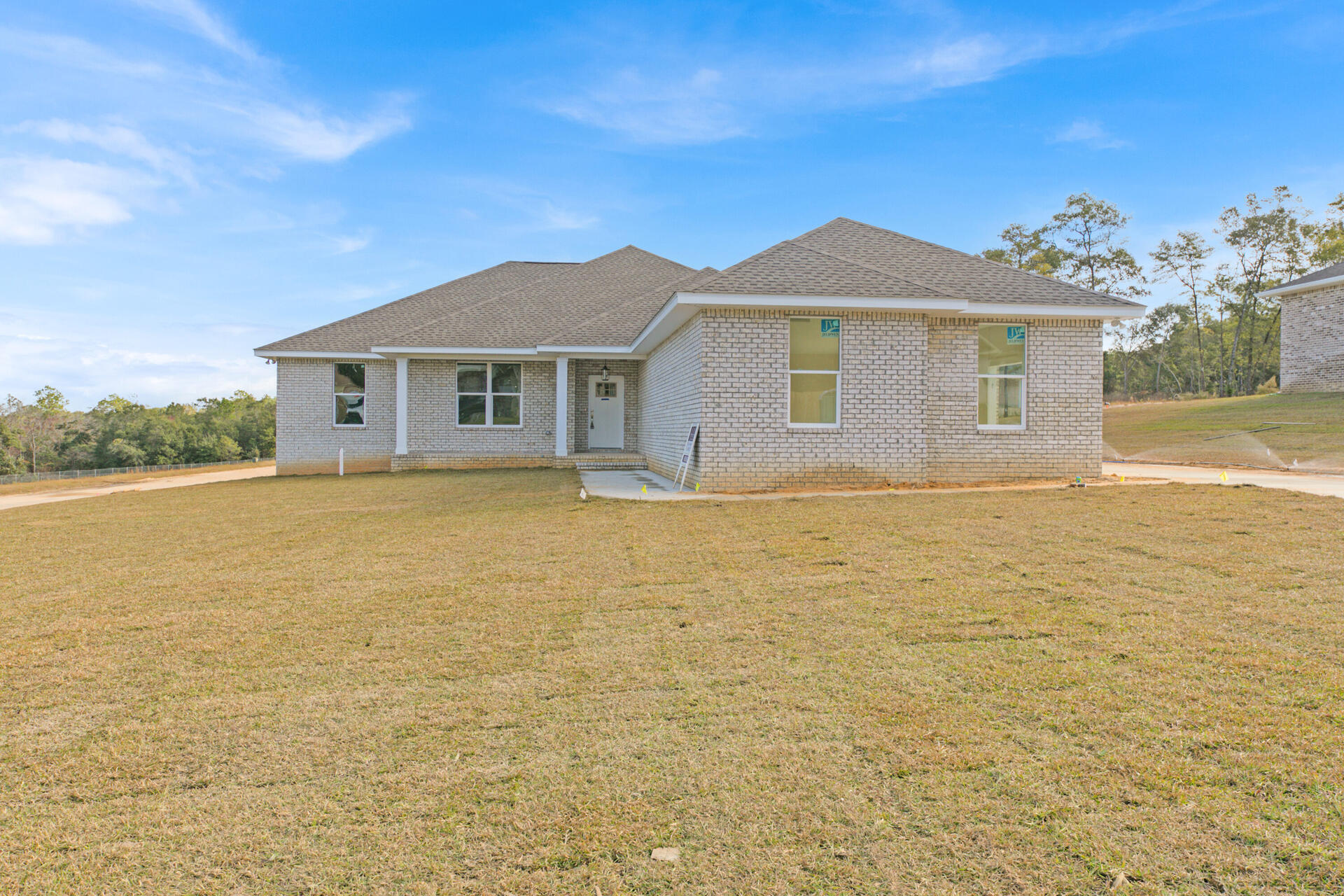 NEW HOME built by a Parade of Homes winner on a 1/2 acre corner lot!! This 4 bed 3 bath brick home with 3 car garage home is stunning. Large open living area, kitchen and dining area overlook the huge back yard. Kitchen has upgraded quartz counters, white and gray cabinetry with tile backsplash!  Master bath is the perfect setup with double vanities, separate tiled shower and a walk in closet. Beautiful LVP throughout the entire home with no carpet.