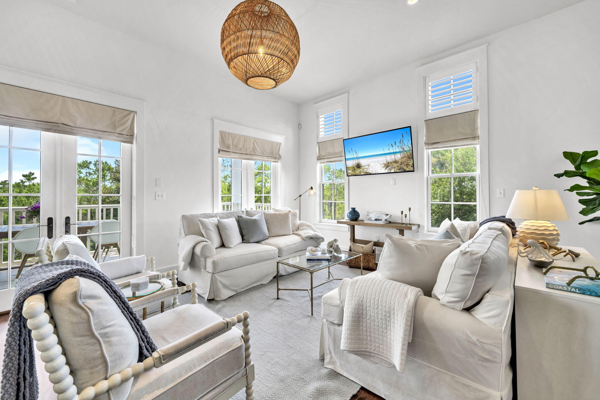 Looking for a fully furnished home with GULF VIEWS that backs up to nature? This is it! 

This stunning, fully remodeled 5-bedroom, 5-bathroom home is located on the quiet west end of 30A, backing up to the untouched Topsail Hill State Park and Preserve. Offering a rare combination of Gulf views and privacy, this thoughtfully designed 3-story retreat blends coastal style, comfort, and functionality.

The first floor features two spacious bedrooms, including a guest master suite with soaking tub and double vanity. The second bedroom also has its own full bath with a large shower. A laundry room, linen closet, and access to a covered patio and fenced backyard complete the level. The 2-car garage and long driveway provide room for vehicles and a golf cart. On the second floor, enjoy preserve views from the open-concept living, dining, and kitchen area. The updated kitchen is fully equipped for family meals and gatherings around the large round dining table. The living space opens to a balcony with grill and views of nature and wildlife. Two additional bedrooms with en suite baths and a front balcony provide more space for guests and relaxing.

The entire third floor is a private master suite featuring sweeping Gulf views, a large walk-in closet, spa-style bathroom with soaking tub, dual vanities, and space for an office or sitting area. French doors lead to a private balcony overlooking the Gulf and preserve, perfect for sunset watching.

Located in gated Cypress Dunes, community amenities include:

Two resort-style pools (one with Gulf views)

Luxury clubhouse with chef's kitchen & TV

Fitness center, tennis & pickleball courts

Outdoor fireplace, green spaces, walking trails, and scenic boardwalks

Move-in ready and beautifully furnished, this coastal gem offers the ultimate blend of luxury, nature, and Gulf viewsperfect as a full-time home or vacation retreat.

**Included in the sale is 50% ownership of the lot in front of this home. LOT-74