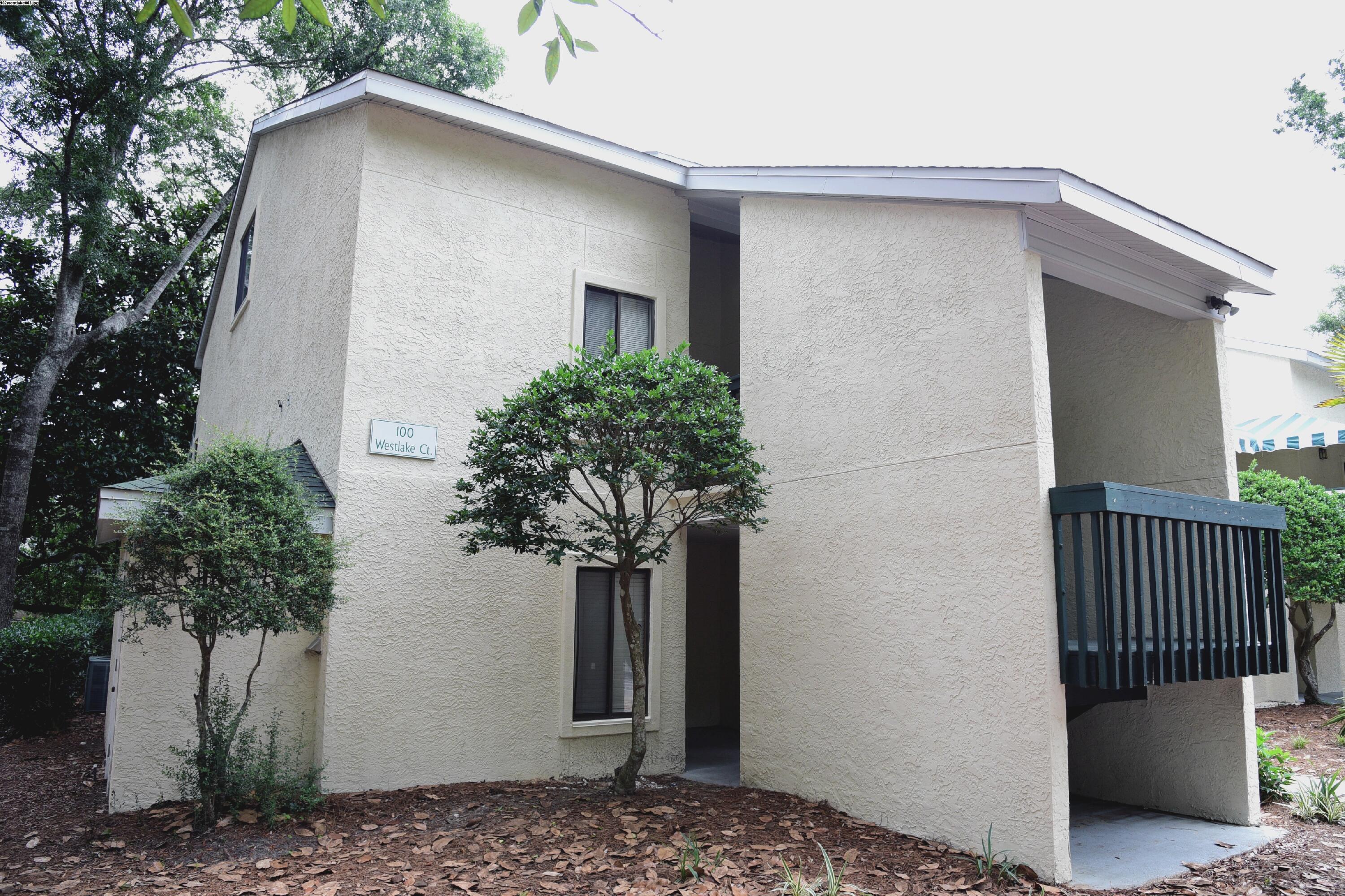 Ideally located end unit in charming Westlake Condo complex. Upgraded tile floors on main floor, with large loft-style bedroom/bathroom upstairs. Cathedral ceiling in living area gives this condo a grand feel. Private balcony with gorgeous lake view. This unit is in a great central location for EOD school, EGLIN AFB and Destin. Owner will consider small pets, restrictions apply. Requires a non refundable pet fee. Any pet must be spayed/neutered, housebroken and current on all shots.  NO Smoking! Any person 18 years old or older must apply separately. Tenants required to carry renter's liability insurance.