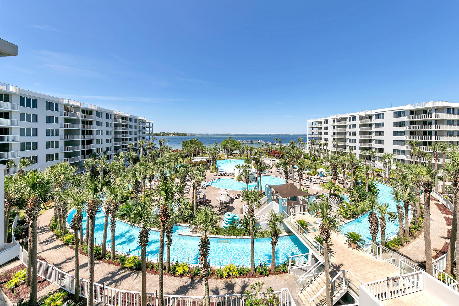 This lovely condo is your ticket to the fabulous beach lifestyle.  Great view of the Choctawhatchee Bay and the famous lazy river pool from the balcony. Beach access is across the street via the sky bridge. Updated flooring and the beachy decor really pop. The bunk room gets you more heads in beds whether you are making family memories or cashing $$$ in on rentals.  There is a sleeper sofa as well.  Master bath has a double vanity , a garden tub, and a walk in shower.   Seller also has a boat slip for sale separately  at the Destin West Marina.  Many fun restaurants and attractions in the area.  Buyer to verify all information