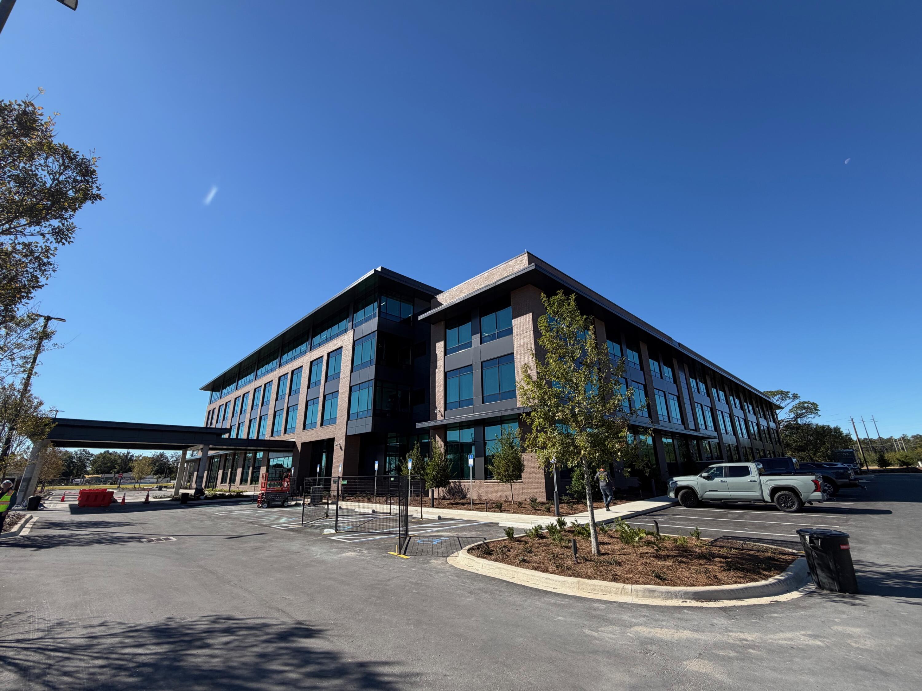 Introducing The District!.  This state of the art new Class 'A' Office building spanning over 13 acres, the campus includes this one of a kind office environment but also includes updated facilities for Okaloosa Gas for operations, HR and training.  The District has been designed with all the latest technology, safety and comfort in mind.  The location of this property near the East Gate of Eglin AFB gives access to defense contractors looking for professional working environment. Common elements of the property include a ground floor dining facility & coffee bar open to the public, beautiful green space as well as a large multi-purpose room that will allow up to 300 people to gather for events.  Tenant spaces are available now as the building has opened for business by its anchor tenant, Okaloosa Gas in January 2026.
