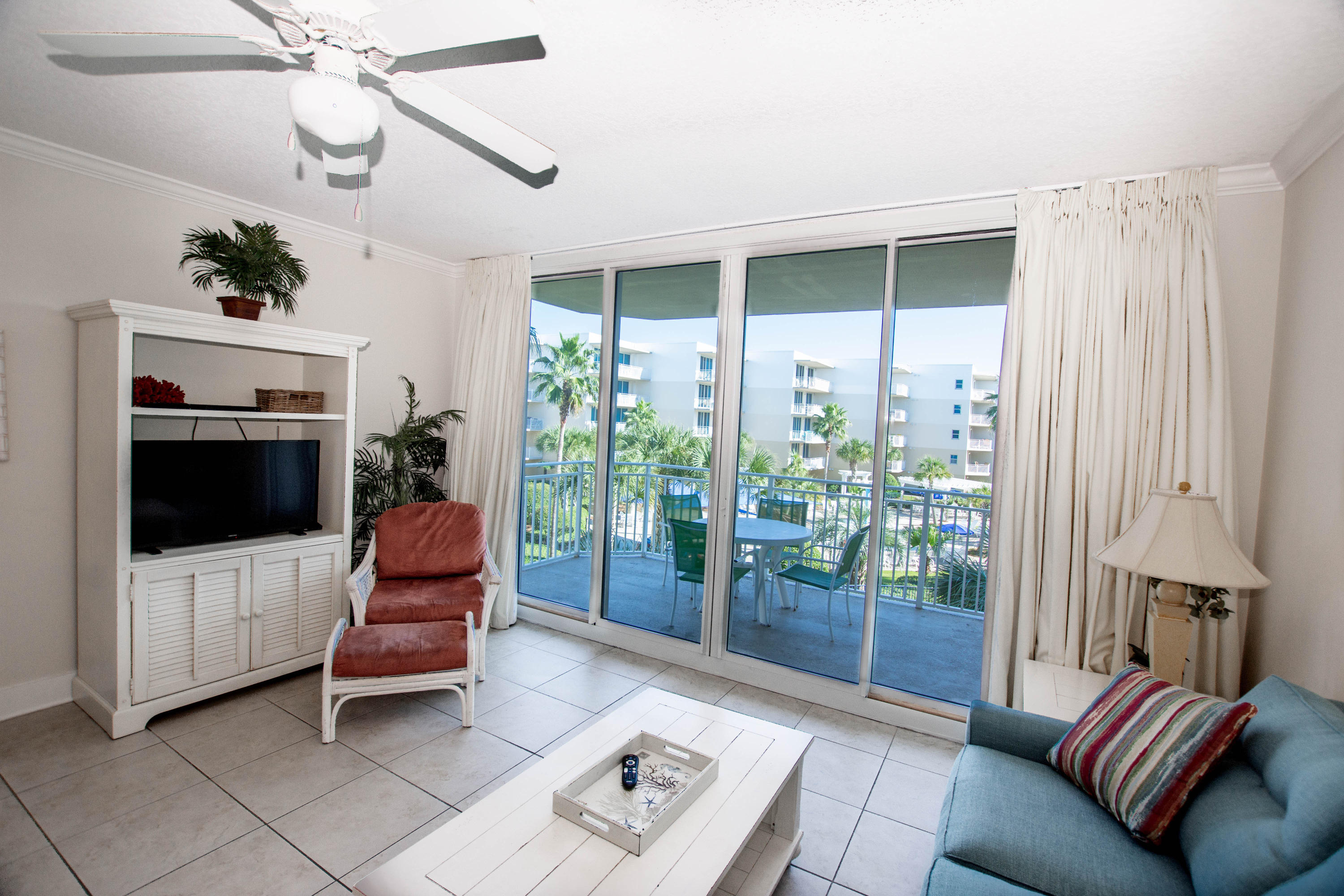 Rare chance to purchase a 1 bedroom, 2 bath unit with BUNKS (which most of the floor plans like this do not have) at Waterscape on the 4th floor! This top rental income producer is decorated perfectly with beachy blue and green colors for a coastal feel! This adorable condo features 9 ft ceilings, crown molding, washer/dryer, stainless steel appliances, granite counter tops, beautiful cabinetry, and more! Enjoy a gorgeous patio that you can access from the living room AND master bedroom. A beautifully landscaped courtyard includes two hot tubs and three resort-style pools, plus a Lay-Z-River and a 10-foot waterfall. This is the best location Fort Walton Beach's Okaloosa Island has near excellent restaurants and attractions!
