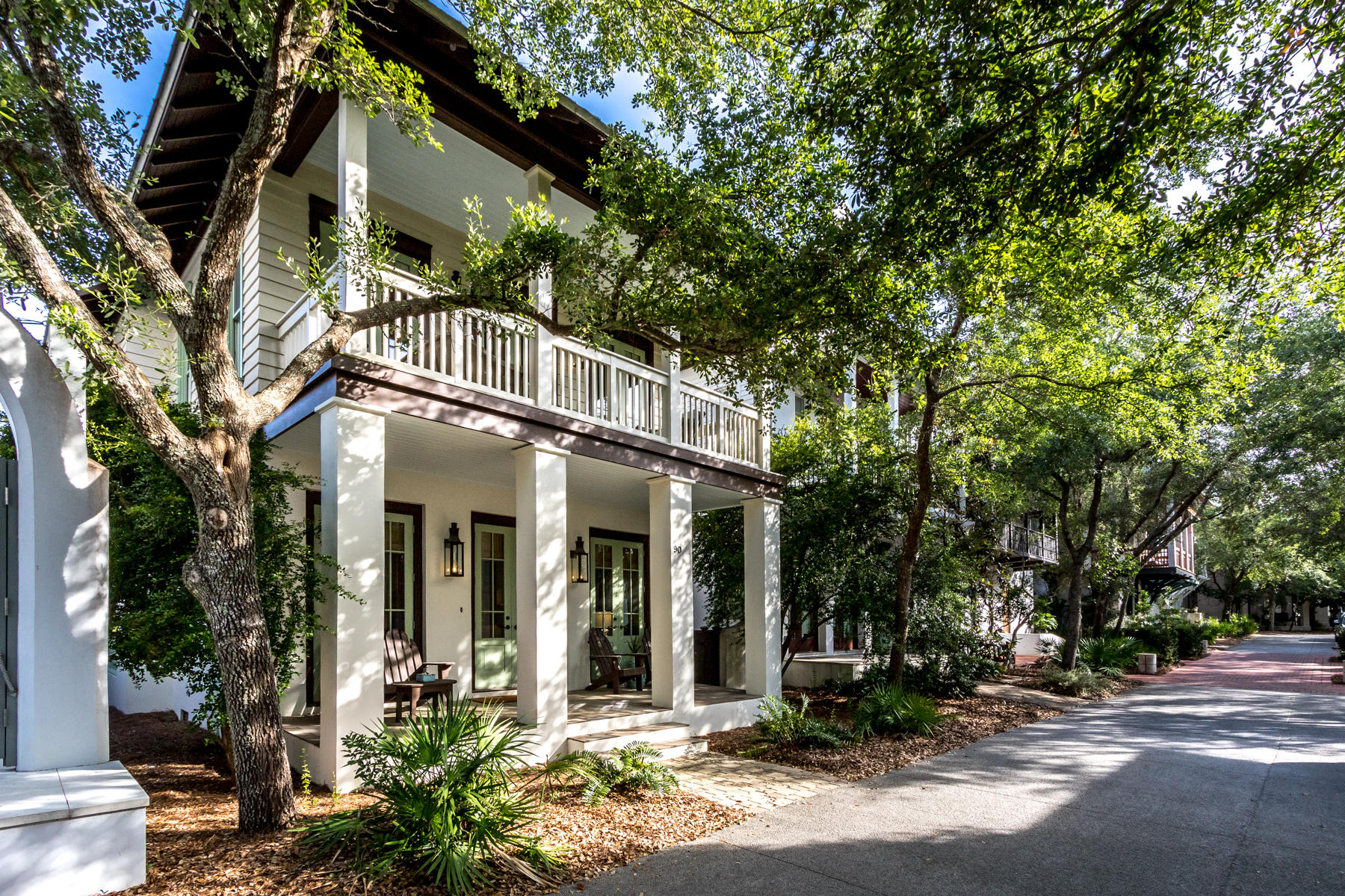 Light and bright, this charming 3 bedroom PLUS bunkroom, 3 bath home welcomes you with designer finishes and a spacious open concept living area, perfect for beach living. Designed by architect Tom Christ, this NEVER RENTED home features; hardwood floors throughout, 10 ft ceilings, a large kitchen with marble countertops and backsplash, abundant windows, stainless steel appliances and a generous pantry. The large & lovely second floor master bedroom offers vaulted ceilings, a private porch and beautifully appointed master bath with dual vanities, marble countertops, garden tub and linen closet. House is being sold fully furnished with a small exclusions list. A 1-car carriage may be built. This home is wonderfully situated on one of the prettiest streets in Rosemary Beach, just steps fro the Barrett Square, the fitness center, sky pool, Rosemary Beach Racquet Club and the Owners' Pavilion. Enjoy a short, shaded stroll or bike ride to the beach!