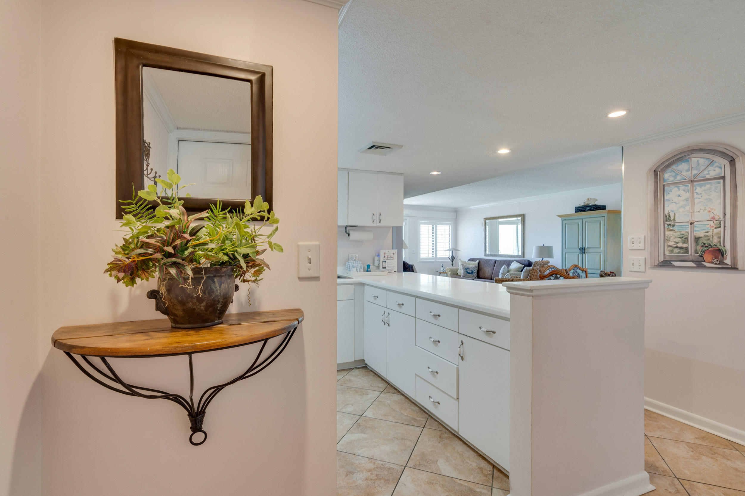 Step inside this ground floor, quaint 2 bedroom condo located just steps to the white sands and the Gulf of Mexico. No waiting for elevators, just open up your patio door and walk across the green space to the beach boardwalk! Enjoy the beautiful beaches of Destin from this condo featuring tile in the kitchen and bathrooms along with beachy decor. Holiday Surf & Racquet Club has tennis courts, shuffle board, boardwalk, beautiful lobby and landscaping throughout the complex. Do not miss out on this condo with fantastic rental potential!