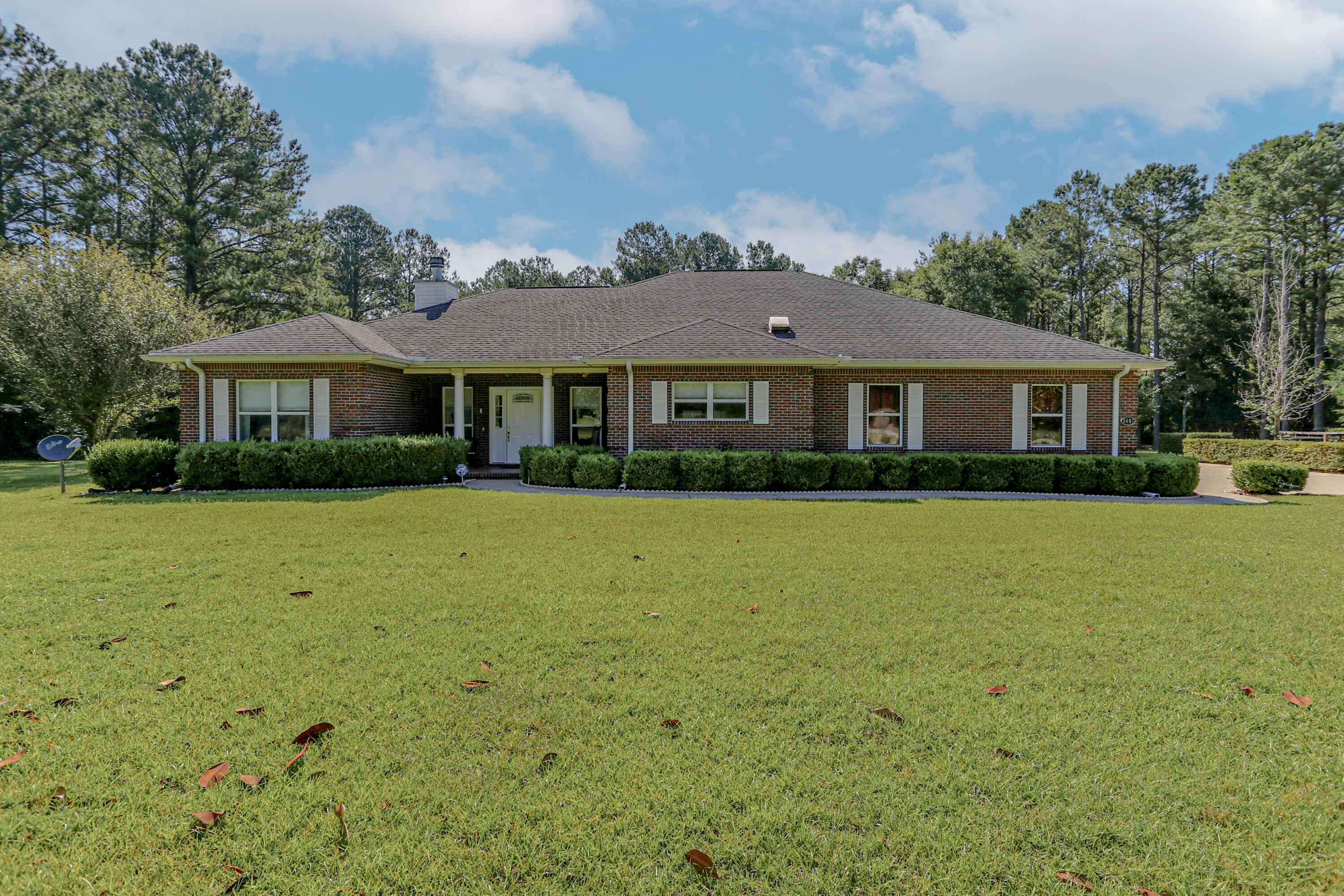Come experience the peace and quiet of this well maintained home with enclosed pool situated on 2 acres in Baker with convenient access to Crestview.  The homes' layout is perfect for entertaining friends and family alike with large chefs kitchen and dining area, large family room accented with a fireplace with access to large (approx 450 sqft separately heated and cooled) enclosed porch overlooking the in-ground pool with integrated hot tub.  The chefs kitchen includes gas cooktop, in wall double oven, large island and an abundance of cabinetry, prep space, and pantry.  The master suite provides ample space to accommodate large furniture with space for a sitting area, large walk in closet, and a walk in shower (with new shower door to be installed).  The home features a split bedroom design with additional bedrooms being nice sized with ample closet space.  The side entry 2 car garage is oversized (25ft deep) and has a separate workshop area with the driveway including space to park an RV and/or boat.  The property has a full irrigation system fed by a well. A new dimensional roof to be installed prior to closing. Schedule your private showing today!