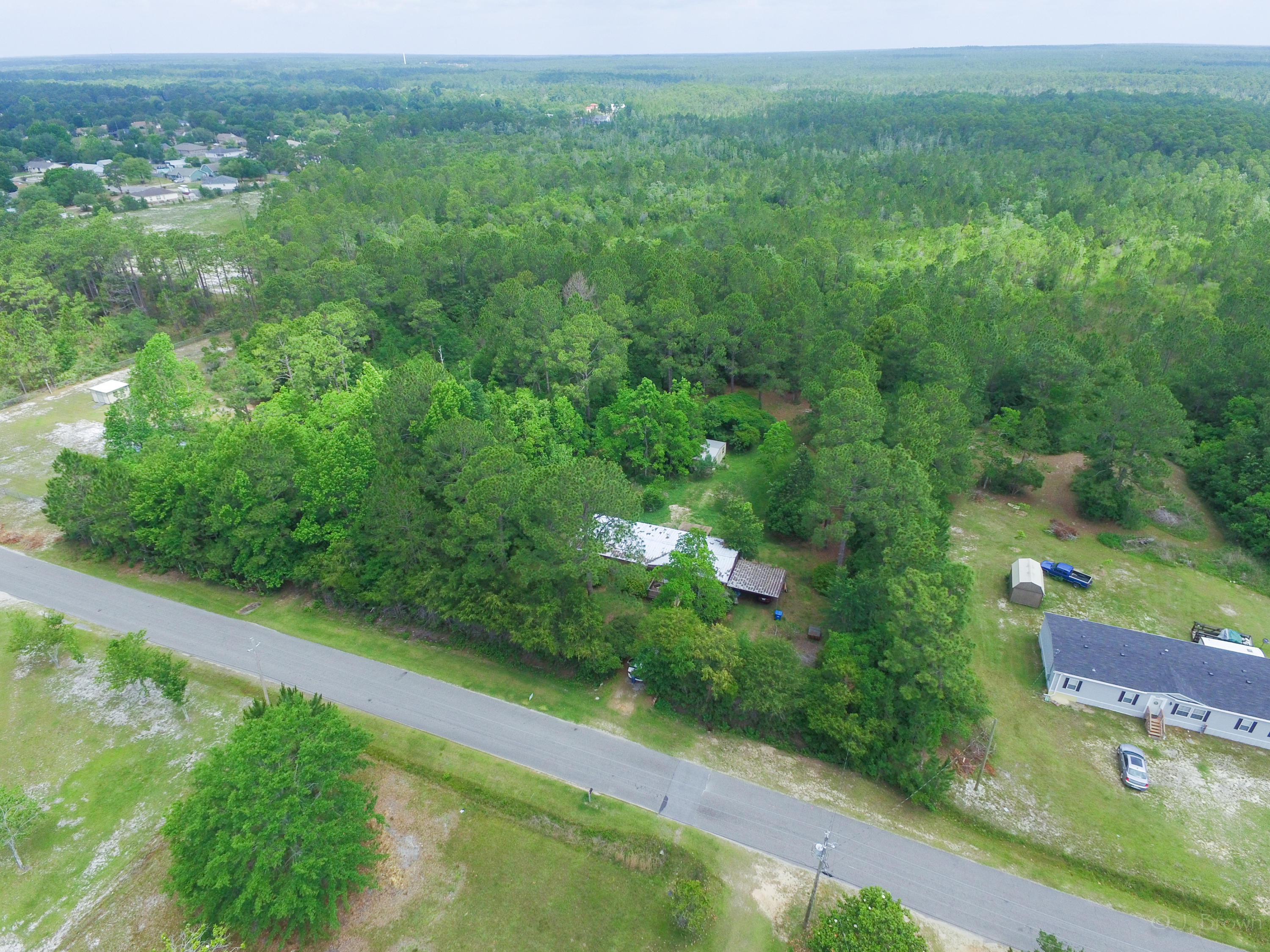 Beautiful, Private, Shaded, LARGE lot.
Existing Mobile home will be removed. AMAZING Lot , which backs up to huge unoccupied woods. private and quiet! includes working water well/ pump and storage shed in great condition. 1.125 Acres! BRING ALL OFFERS