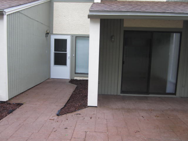 Welcome to Royal Oaks Village, just off Bay Drive the cutest community tucked away in Bluewater Bay and within walking/biking distance to the Marina, Schooners and the Bay. This 3 bedroom, 2.5 bathroom townhome is a rare opportunity as this floor plan does not come on the market often. The master bedroom is located on the 1st floor, very generous in size with , his and her closets and ensuite bathroom with shower/tub combination. The kitchen has plenty of cabinets, a breakfast bar, and dedicated pantry. There is also a screened porch off the dining area at the back of the unit.  Soaring ceilings make this town home live larger than its square footage. There is a 1/2 bathroom on the main level. On the second level two additional bedrooms generous in size and plenty of closet space.  Second full bathroom on second floor, plus office/loft nook perfect for home office.
The exterior features of this townhome include: one-car carport with over-size storage area plenty of extra space for the odds and ends. Two outdoor patios 1) courtyard at the front of the property 2) paver patio just the master bedroom with privacy fence
 Located central to WinnDixie/Publix, Eglin AFB, the Mid-Bay Bridge connector, NWF State College and the world's most beautiful beaches. Royal Oak Village's location is in the heart of Bluewater Bay's resort community! Amenities in Bluewater Bay include tennis center, pickleball, 3 pools, golf course, Bayfront marina, walking paths, boat launch and playground. To use Pool and other amenities there may be a fee the tenant would need to sign up with Bluewater and pay whatever fee is required to use those amenities. ( homeowners HOA fee only covers the grounds care and building in 800 Royal Oak Village- and Homeowner pays that fee) Calll the office number to  make an appointment to view today.