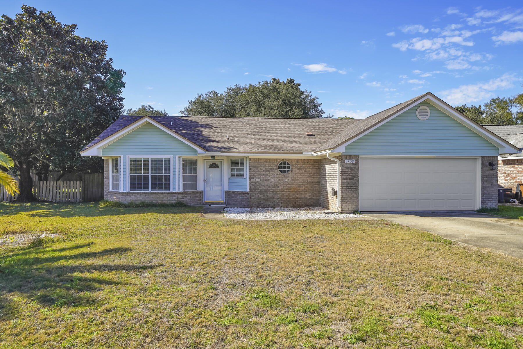 Charming 3 bedroom 2 bath home in Legend Cove Subdivision on Southside of Hwy 98, with water access to the Santa Sound. You'll be impressed with this home, featuring granite countertops, wood flooring, fireplace and an awesome Florida room making this home feel much larger. New roof in 2017.
Home is walking distance to the neighborhood water access. Grab your kayak or Stand Up Paddle board and enjoy our beautiful Santa Rosa Sound. The large back yard makes for a great place to add a swing set or play ball with the kids.  Come by and check out this cute home. Washer and Dryer will convey