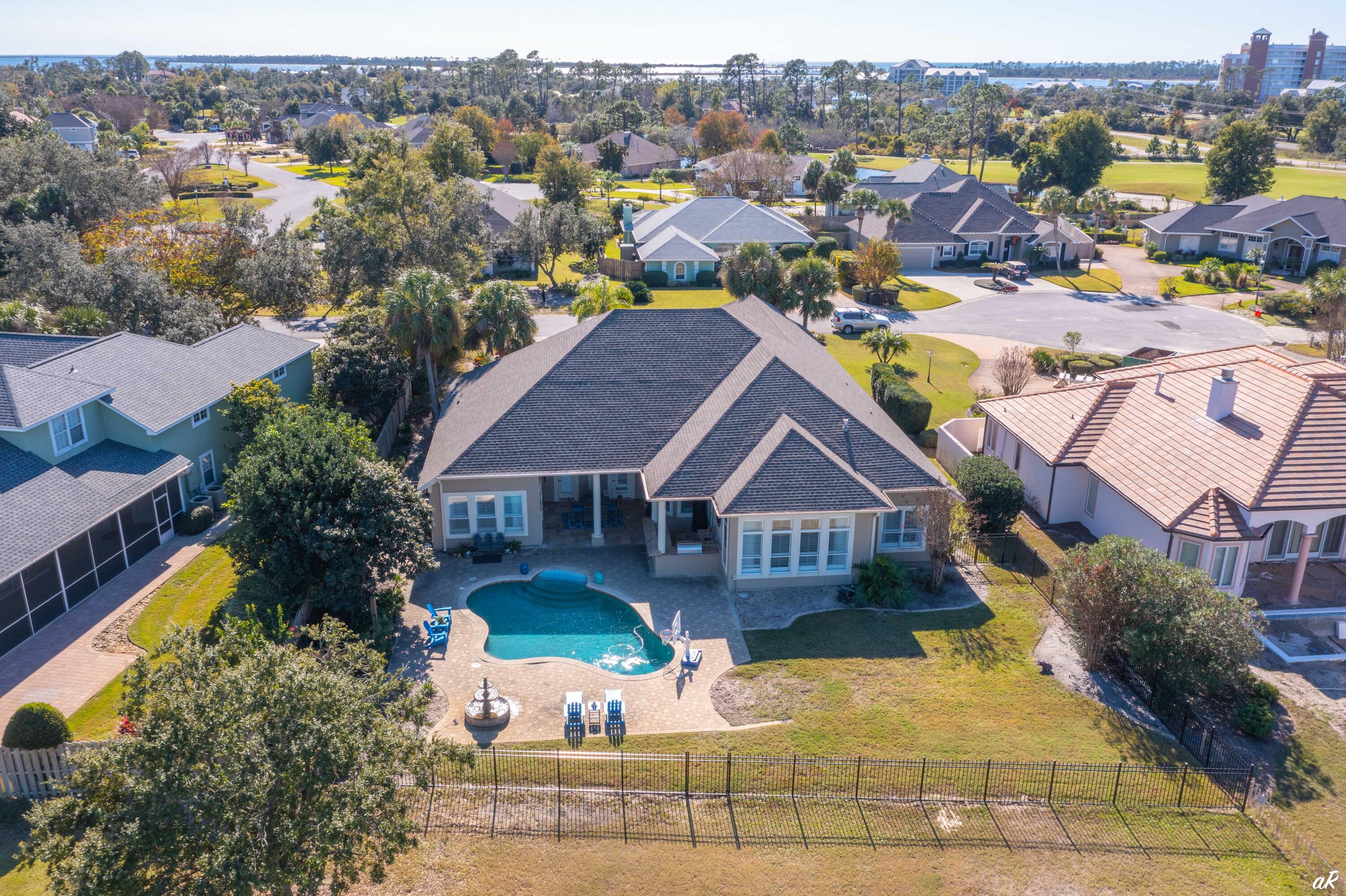 Executive Home rental available April 15th, 2023. Magnificent custom built home overlooking the 7th hole of Bay Point's Nicklaus Course. This home is in the gated Fairways side of Bay Point with full time security. Open floor plan with large gourmet kitchen with island, stainless appliances, gas cooktop, double ovens, dishwasher, spacious walk-in pantry, granite island and large family style bar, sunny breakfast area and family room with many custom built-ins and matching granite shelves. Formal living room with coffered ceiling and gas fireplace and dining rooms with Australian cypress hardwood floors, wet bar with wine cooler and ice maker. Large office with 2 custom-built desks with granite tops, shelving and wall units/gun racks plus sitting area.