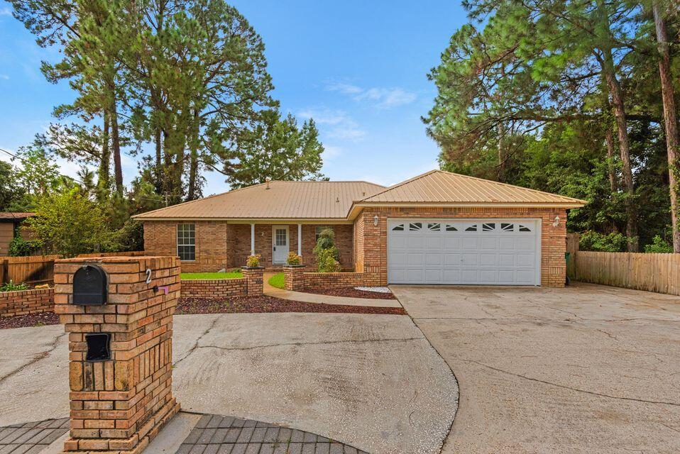 BACK ON MARKET YOUR WISH CAME TRUE! YOU WOULD LIKE TO HAVE A 3 BEDROOM, 2 BATH, 2 CAR GARAGE AND EXTRA PARKING. A NICE SIZE YARD WITH LITTLE MAINTENANCE, MAYBE A COUPLE SMALL FLOWER GARDENS TO WATCH THE  BIRDS AND BUTTERFLIES, A UNIQUE FRONTYARD, SOME TREES,  MAYBE SIT BY THE  WATER. ALL BRICK AND A METAL ROOF FOR NO MAINTENANCE, GAS HEAT AND STOVE. IF THIS IS WHAT YOU WISH FOR, LOOK NO FARTHER , YOUR OWN WELL IS ON THE PROPERTY TO MAKE OTHER  WISHES. LOTS OF  AMENITIES. APPLIANCES 4 YEARS OLD. PLEASE READ ON.