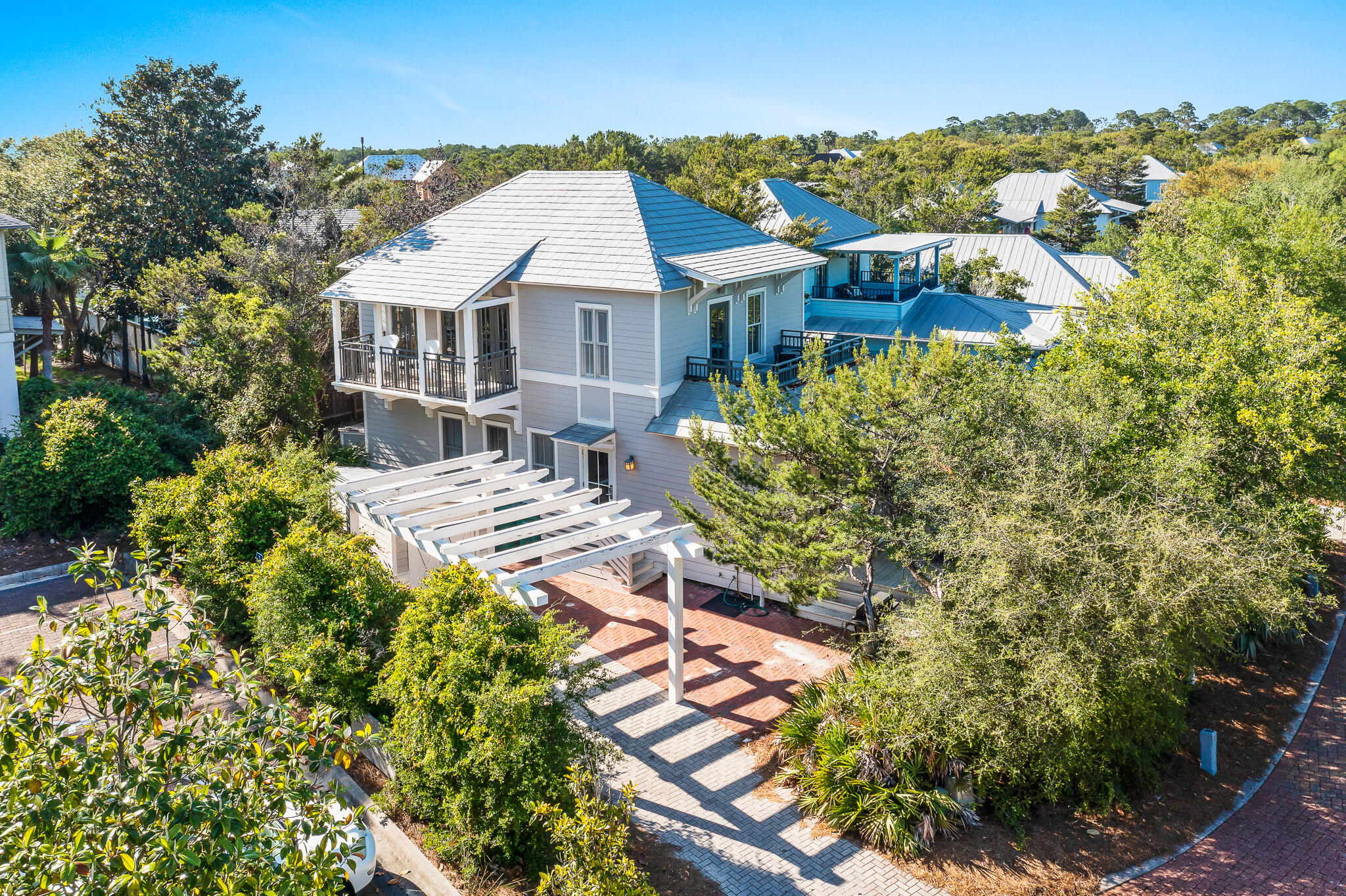 Welcome to 43 Patina Boulevard, the beautiful ''beach cottage'' in the popular Magnolia Cottages By The Sea neighborhood. This adorable fully-furnished 3 bedroom, 4 bathroom home is just steps from the beach, and all the fun! Enjoy time on the beach with friends and family- and enjoy time inside the home with an inverted floorplan (which puts the kitchen upstairs for better views), bunk beds in the hallway, and the living room, dining room and kitchen on the second floor. Enjoy the wonderful community area, located just across from the deeded beach access. The home is close to the heated neighborhood pool, but just far enough away to enjoy a little privacy and security. Home is elegantly furnished, with stainless steel appliances, sunshade parking, and much more. Don't hesitate to schedule your showing today!