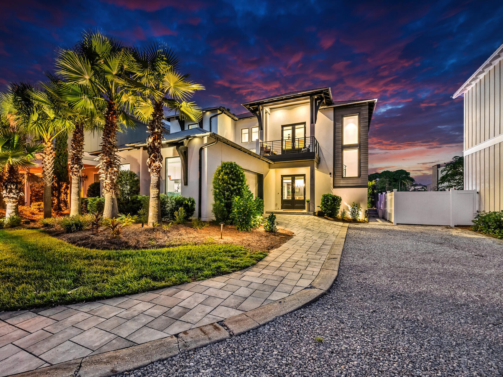Discover modern coastal luxury in this custom-built home located in the gated community of Emerald Waters Village in Miramar Beach. Just a short walk to restaurants, shopping, and the neighborhood's deeded private beach access, this property offers exceptional convenience and strong rental potential with projected annual income over $180,000.

A wall of floor-to-ceiling windows overlooks the private heated saltwater pool and outdoor courtyard, filling the home with natural light. Interior features include a reclaimed wood accent wall, Heat & Glo gas fireplace, and designer finishes throughout. The gourmet kitchen is equipped with Thermador appliances, quartz waterfall island, custom cabinetry, and under-cabinet lighting. The first-floor primary suite offers a spa-style bathroom with a zero-entry walk-in shower, custom dual vanity, and premium tile selections. Upstairs, a spacious second living room provides additional gathering space, along with five bedrooms including a dedicated bunk room, making the home ideal for vacation stays or multi-generation use.

Residents of Emerald Waters Village enjoy two community pools, gated security, sidewalks, and close proximity to the Gulf, entertainment, golf, and attractions along Scenic 98 and 30A.

A luxury coastal property with private beach access, rental-ready design, and outstanding investment potentialperfect for a second home or vacation rental.
Golf cart not included in sale.