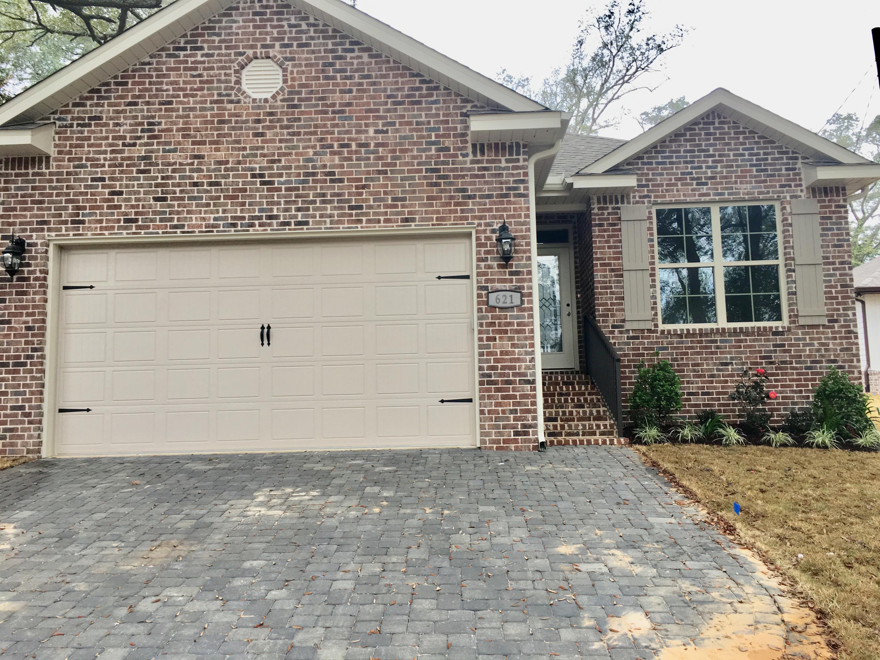 BRAND NEW HOME: As you drive up to this beautiful 3 bedroom 2 bath brick home you will just love the driveway that has beautiful stone pavers. This home has gorgeous oak trees in front and back yard.
Yard is beautifully landscaped with Zoysia grass. This home has a very roomy living room for lots of entertaining. The kitchen has beautiful cabinetry and granite countertops. Adjacent to the kitchen is a large dining area. Back porch has covered lanai. Master bedroom has a gorgeous tray ceiling and large walkin closet. Make this fabulous home yours today. Buyer to verify all measurements deemed to be accurate.