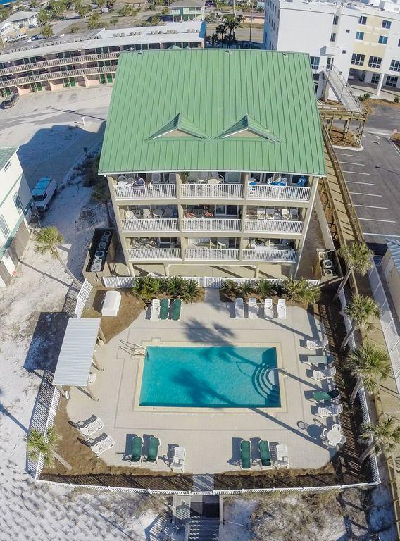 This Gulf front retreat has the perfect location with unobstructed views of the white sandy beaches and Emerald green waters of the Gulf of Mexico. Enjoy dolphin watching frequently and sunset views every night from your balcony. This unit has tile floors int he main areas & carpet in the bedroom, a breakfast bar, and coastal chic furnishings. The peaceful bedroom has a queen size bed and the hallway has twin bunks. This low density building offers privacy having only 9 total units with manicured landscaped grounds, a beach walkover, Gulf front pool, picnic area, & covered parking. Close to dining, shopping, entertaining and Destin. YTD gross rental income is just over $29K. Stucco siding currently being redone on complex. Buyer to verify all dimensions.