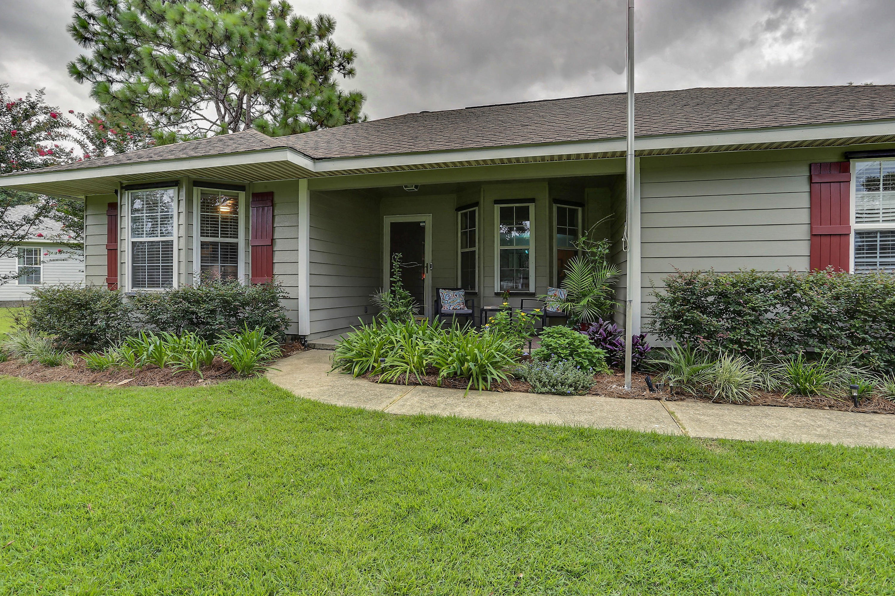 You won't want to miss this completely renovated, adorable family home on a quiet cul-de-sac in Holley by the Sea!  LVP flooring throughout main areas, carpet (installed 2018) in bedrooms, wood look tile flooring in the remodeled master bathroom, tiled walk-in shower, two walk-in closets, separate vanities with new mirrors & fixtures, kitchen has stainless appliances (refrigerator does not convey), tile backsplash, breakfast bar, quartz countertops with refinished cabinets and custom shelving/cabinetry surrounding fireplace, no popcorn ceilings, recently painted (interior and exterior), custom window bench in bay window and custom coat/shoe bench in office, shiplap accent walls, new fans/fixtures throughout, with an open layout, split floorplan. The yard is one designed for enjoying the Florida lifestyle with 1/2 fenced in lot, pergola, fire pit, fenced English garden with separate kitchen/herb garden, above ground pool (pump and liner replaced 2018), lofted 12x16 shed, custom two story tree house, and irrigation.  Home is serviced quarterly and has termite bond with Bryan Pest Control.  Septic cleaned & serviced in Spring 2020.  Front lawn is zoysia grass, back is zoysia and centipede, and entire lawn is maintained and treated monthly by Father & Son.  
The Holley by the Sea Association is recently remodeled as well with three separate pools (one heated & enclosed for winter), gym, tennis courts, access to both Sound and Bay, fishing dock/gazebo, clubhouse, playground, campsite, and  before/after care and summer camp for children.