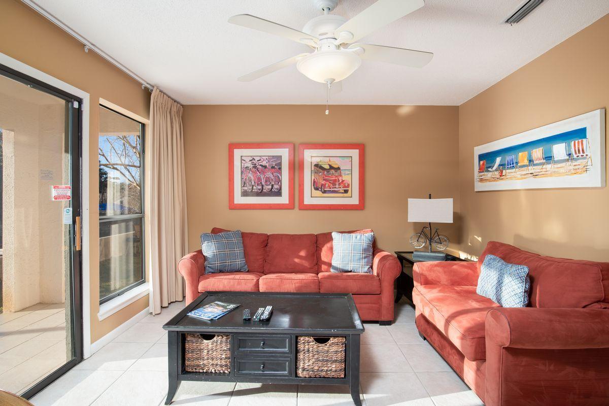 This exquisite property in the popular Tops'l Tennis Village is fully furnished and ready for enjoyment. Tennis enthusiasts will adore the location of this outstanding townhouse style condo overlooking Court 1 (center court) near the fitness center and main club house.  The open floor plan allows guests to move seamlessly from the light and airy living room to the warm kitchen and generous dining room. The expansive master suite offers a private balcony and ensuite bath with dual vanities. Tops'l is a nationally renowned tennis resort with all the amenities that make it a great place to vacation and enjoy. This desirable gated community offers 600 ft. of sugar white sands, amazing fitness center, year round tram service, two restaurants on site, and much more.  It doesn't get any better!