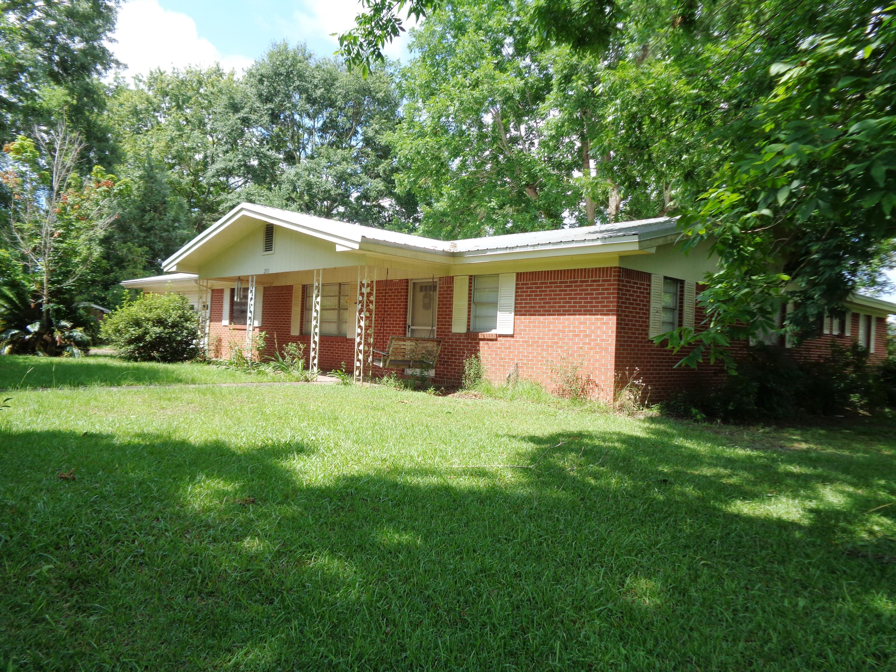 LOCATED IN THE NEW HARMONY COMMUNITY THIS 81 ACRE FARM IS JUST WHAT YOU HAVE BEEN LOOKING FOR! BRICK HOME OFFERS 3 BR, 2 BA, A LARGE LIVING AND FAMILY ROOM, FORMAL DINING AND GREAT KITCHEN AREA WITH LARGE UTILITY AND PANTRY. HOME SITS SURROUNDED BY TONS OF PECANS AND FRUIT TREES. PROPERTY HAS A LARGE BARN, FENCED AREA FOR HORSES PLUS A GREAT POND. PROPERTY IS IN CULTIVATION AND IS ABSOLUTLEY BREATHTAKING. GREAT LOCATION TO MAKE YOUR NEW FAMILY FARM OR WEEKEND GETAWAY!