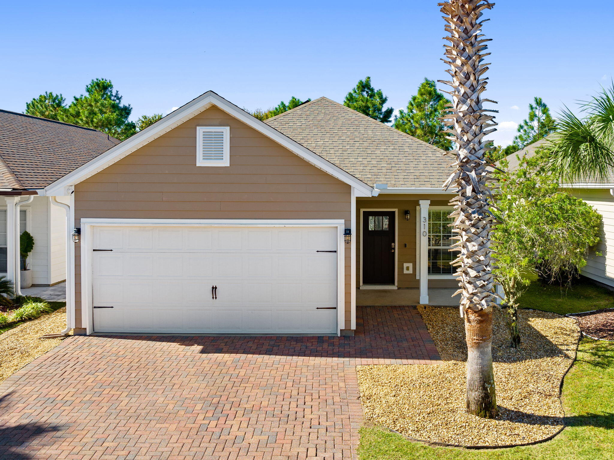 No Short Term Rentals Allowed. This charming 3-bedroom, 2-bathroom home offers coastal comfort and modern convenience in one of Panama City Beach's most desirable communities Turtle Cove on Lake Powell. Step inside to find an open and inviting layout, a spacious kitchen and living area, and a large laundry room leading to the 2-car garage. Enjoy year-round relaxation in the enclosed patio overlooking your private, fenced-in backyard, complete with a beautiful fire pit--perfect for cozy evenings or entertaining friends. This home features fully paid-off solar panels and an electric car charger, providing eco-friendly living with an average electric bill of only $29 per month. Turtle Cove at Lake Powell offers an unbeatable lifestyle with resort-style amenities including a clubhouse, Pickleball courts, swimming pool, fitness center, and a community dock for enjoying the water. The clubhouse can also be reserved for private events and gatherings, making it easy to host celebrations close to home.
