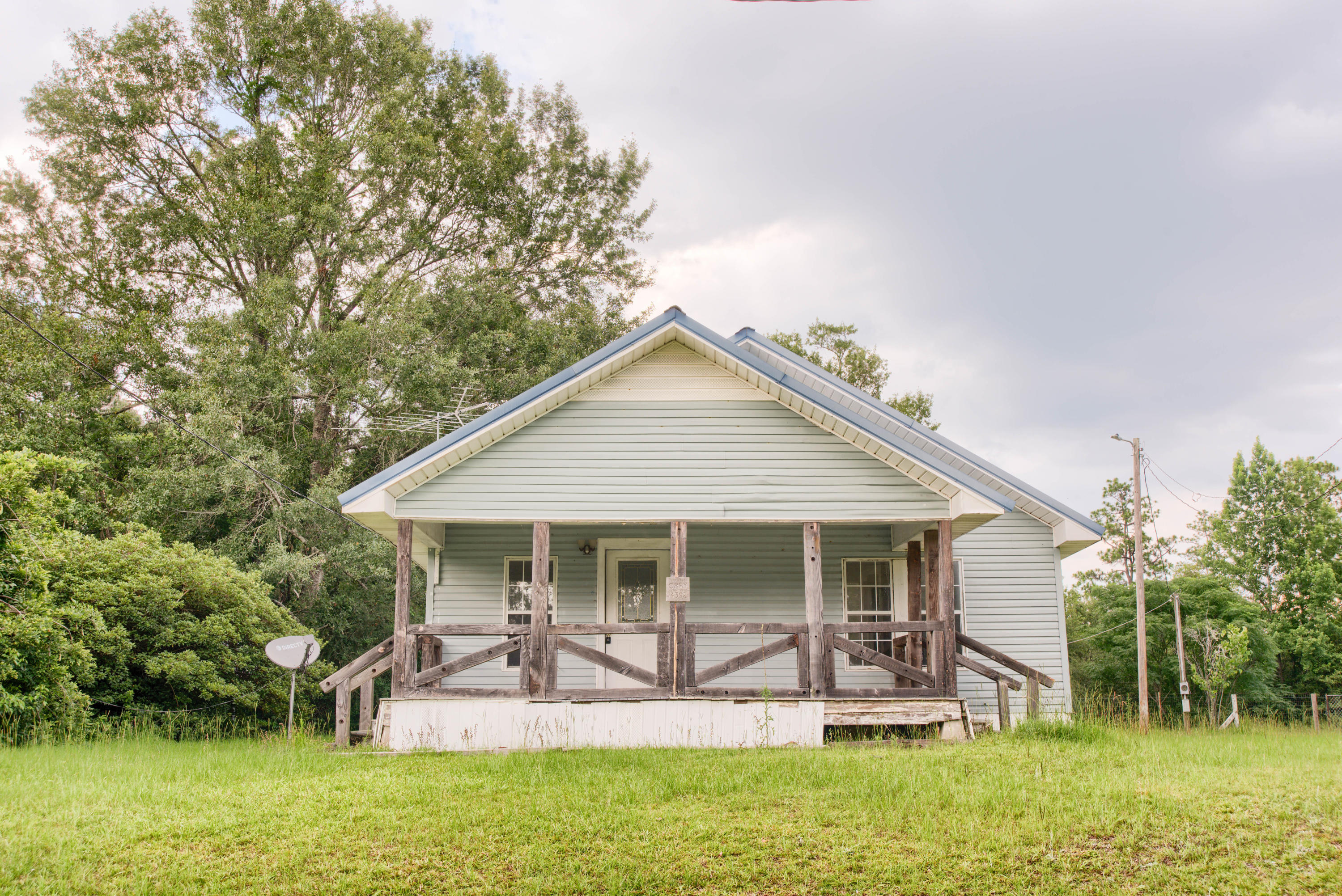 Excellent opportunity to own this 1BR/1BA REO home situated on 1 acre of seclusion. This property is zoned for agriculture and most of the land has been cleared. The home offers a large covered front porch, a light & bright living room, separate dining space or additional living area, laundry/utility room and a spacious, eat-in kitchen. The master bedroom offers beautiful views of the property and features a separate siting area, walk-in closet and private bath w/ dual sinks and garden tub. Out back you'll find a detached shed and rear covered porch that overlooks the backyard with plenty of room to roam. All Information recorded in the MLS is intended to be accurate but cannot be guaranteed, buyer advised to verify. Sold As-Is. Only Cash/Renovation loan offers