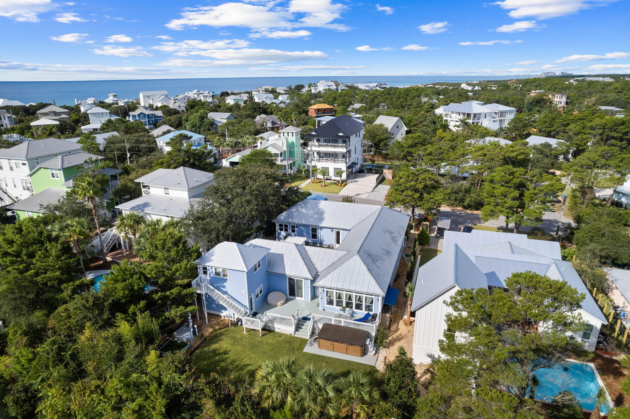 Offered for the first time, this stunning property boasts a prime location just steps away from the Dune Allen Beach Access. 196 Hilltop is a unique and versatile single level property, with 3,200 square feet of thoughtfully designed and accessible living space, split primary suites with luxurious ensuite bathrooms, spacious walk in closets, sitting areas, and private access to the main court yard and garden, which is one of three beautify landscaped gardens adorned with fruit trees, palm trees, roses, a jasmine wall, pergola and water fountain. Another of the many notable features is a newly built two story apartment in the back garden with a private access, a full kitchen, living area, two bedrooms and a full bath, comfortably accommodating seven guests - ideal for renting or Airbnb.