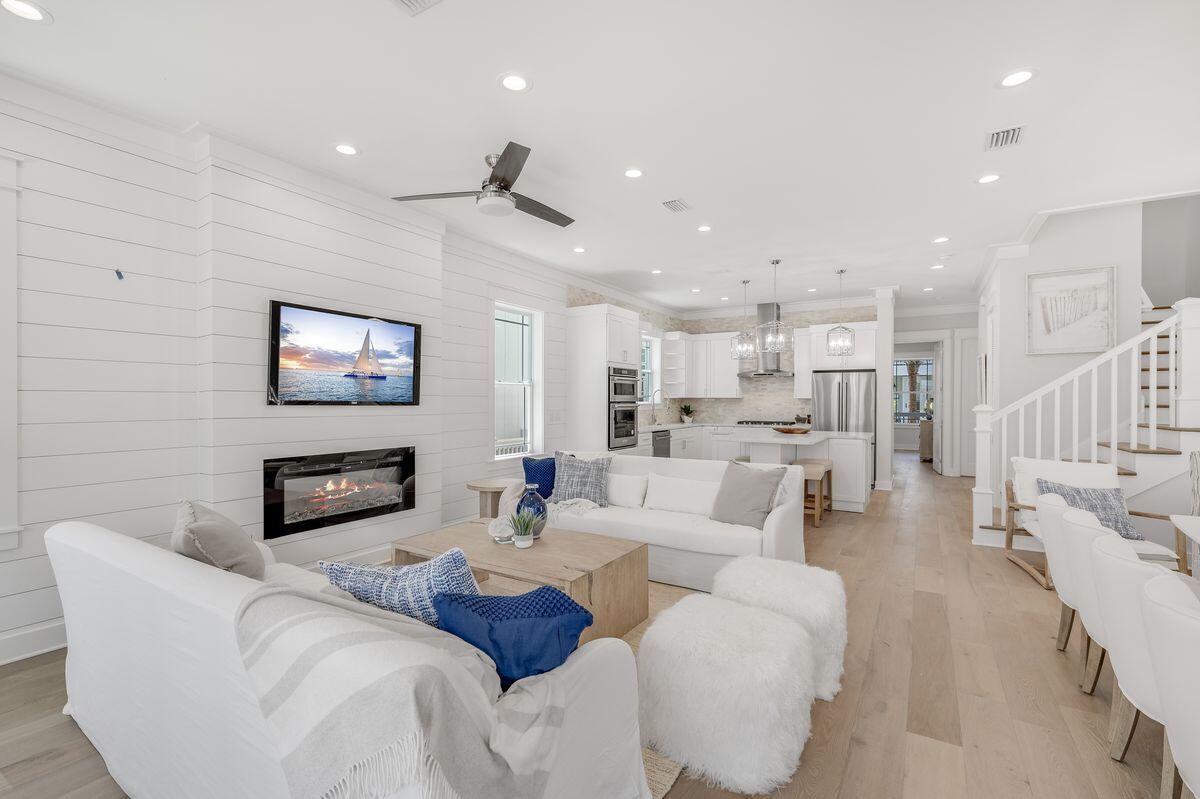 Brand new construction awaits in the coveted coastal community of Seacrest, ideally positioned between Alys and Rosemary Beaches along Scenic Highway 30A. Boasting nearly 3,000 square feet of living space, five bedrooms and five-and-a-half baths spread over three stories, this fully-furnished home is ideal for large groups or rental investment. Recently completed in 2022, this home offers high-end finishes, owner's suites on the first and third floors, two living areas and abundant natural light in an open-concept design. The second floor provides two bedrooms and a bunk room with access to a second-story porch ideal for relaxing after a day in the sun. This home offers convenient access to a large lagoon pool and beach access as well as tram service to the beach and close walk to restaurants and shops in 30A's most beloved communities.