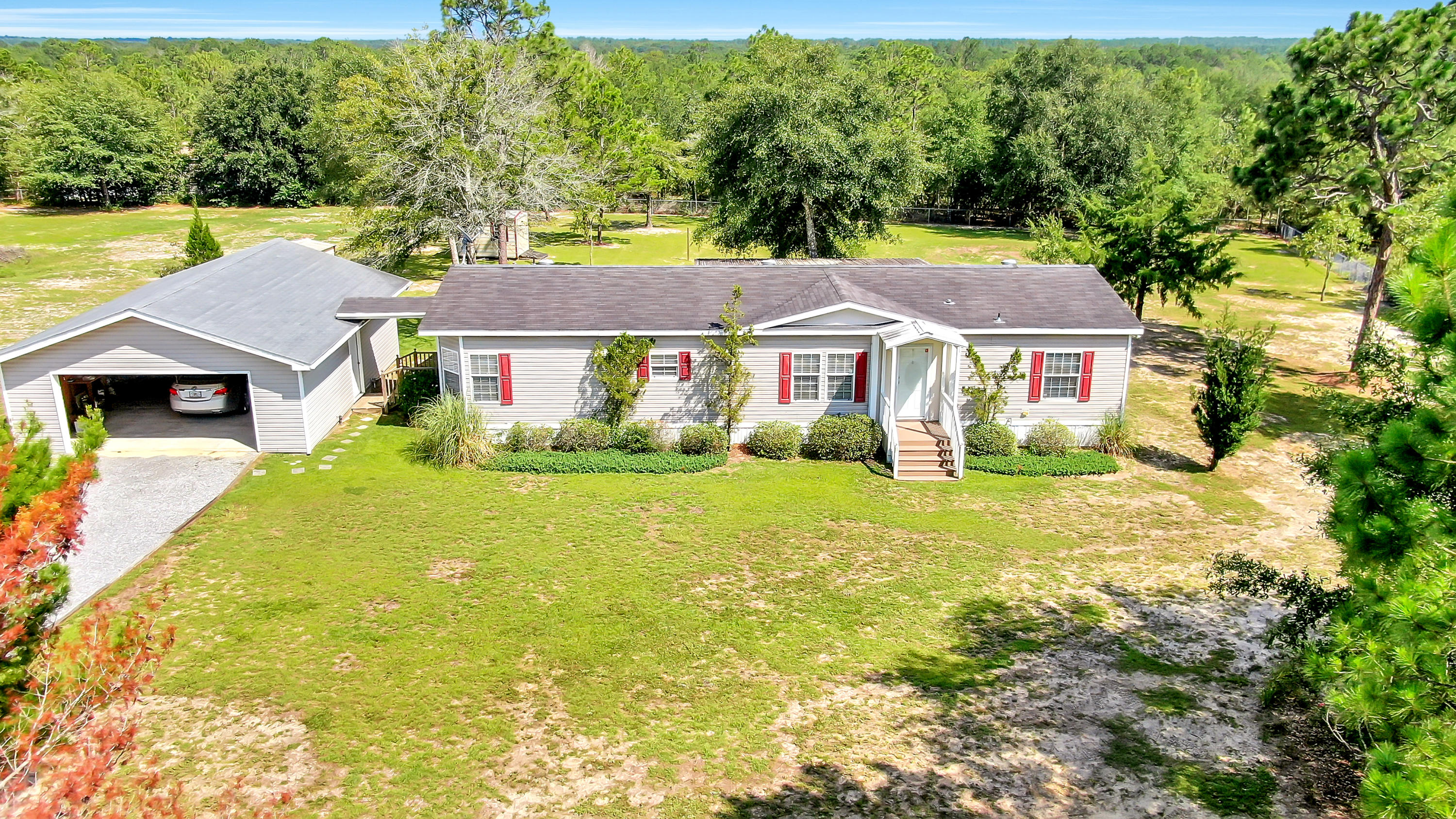 One owner, excellent condition & move-in ready on 1+ acre, entirely fenced. The huge kitchen with loads of cabinets & countertop space & room for an island is tops on the list of features. The split floor plan offers a large, open living room with doors to your covered back porch. The 2 car garage is perfect for parking or storage - or both! Located at the end of a dead end road, you're sure to get the privacy and quiet you're looking for. It isn't often you find a home in this condition at this price point, so don't wait to make it yours!