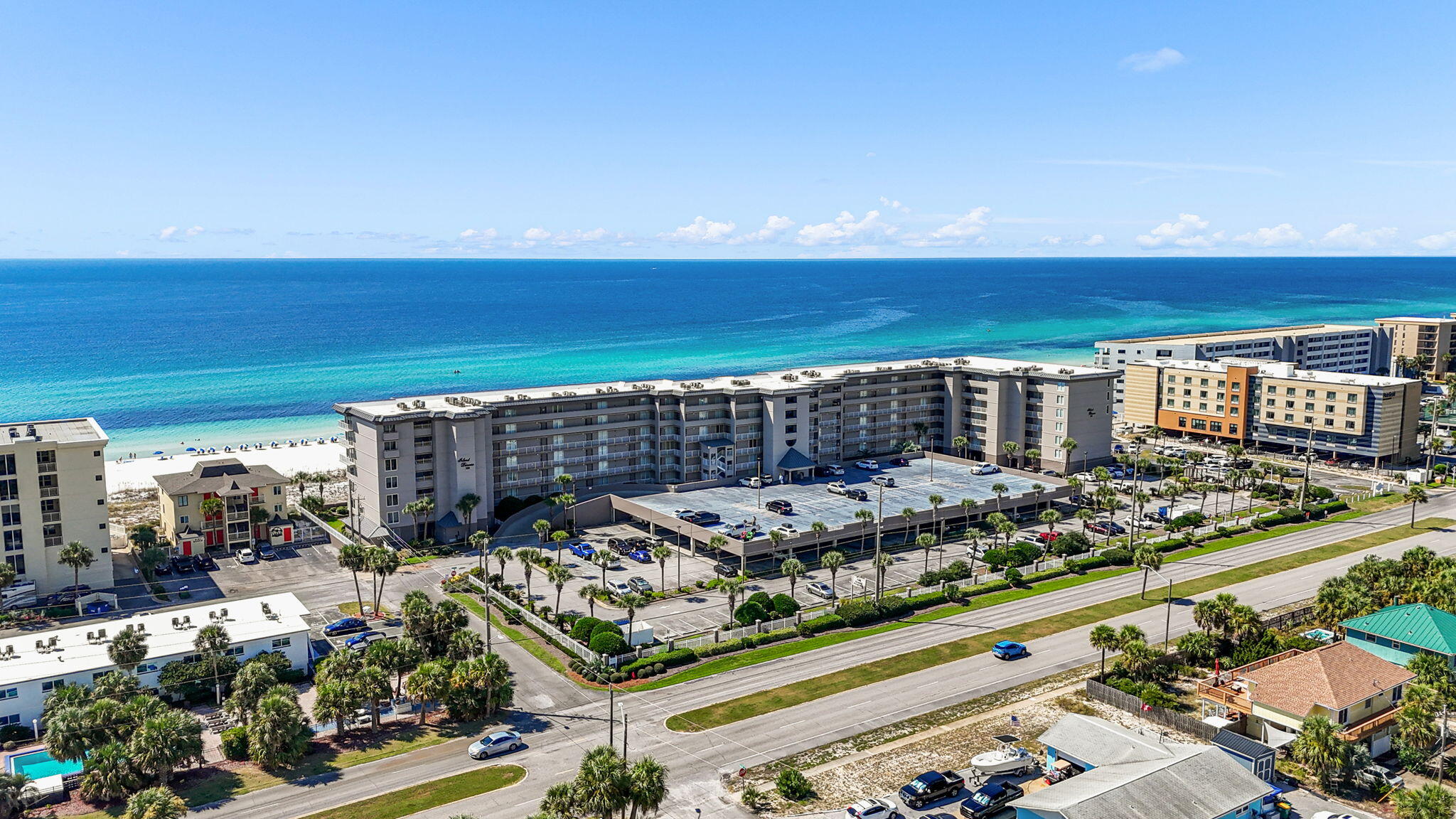 Discover coastal sophistication at the prestigious Island Princess, one of Okaloosa Island's most desirable beachfront residences. This fully furnished 3-bedroom, 3-bath condominium on the 5th floor offers sweeping, unobstructed Gulf views from the expansive living area and the master suite with private balcony access. Indulge in resort-style amenities, including a heated Gulf-front pool, private beach access, picnic and grill area, and a state-of-the-art fitness center. A reserved covered parking space adds convenience. Ideal as a primary residence, vacation retreat, or lucrative rental investment—an exceptional opportunity for refined beachfront living.