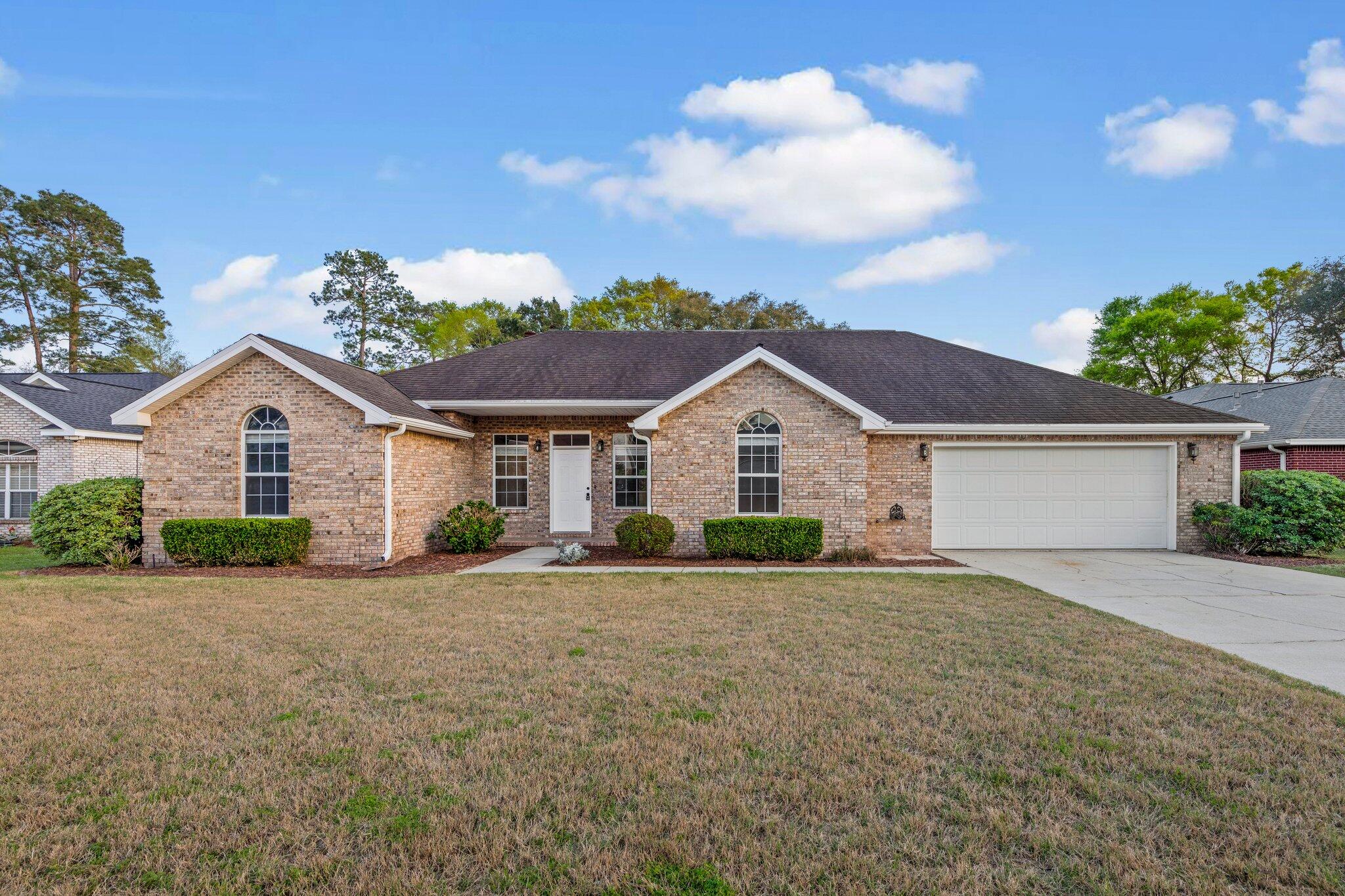 Located in the desirable neighborhood of Huntington in Rocky Bayou, you will want to see this great single story 3 bedroom/2 bath brick home & 2 car garage. This home features an open floor plan and vaulted ceilings in the family room. Beautiful custom built-ins and wood burning fire place are a few of the focal points of this home. To the left after entering the home, are 2 bedrooms and a full bathroom located in the hallway which features a double vanity. The kitchen, overlooking the family room has been updated with granite counter-tops, beautiful cabinetry & newer kitchen appliances. Off the kitchen is a large formal dining room area which also opens back up to the family room, making entertaining easy!