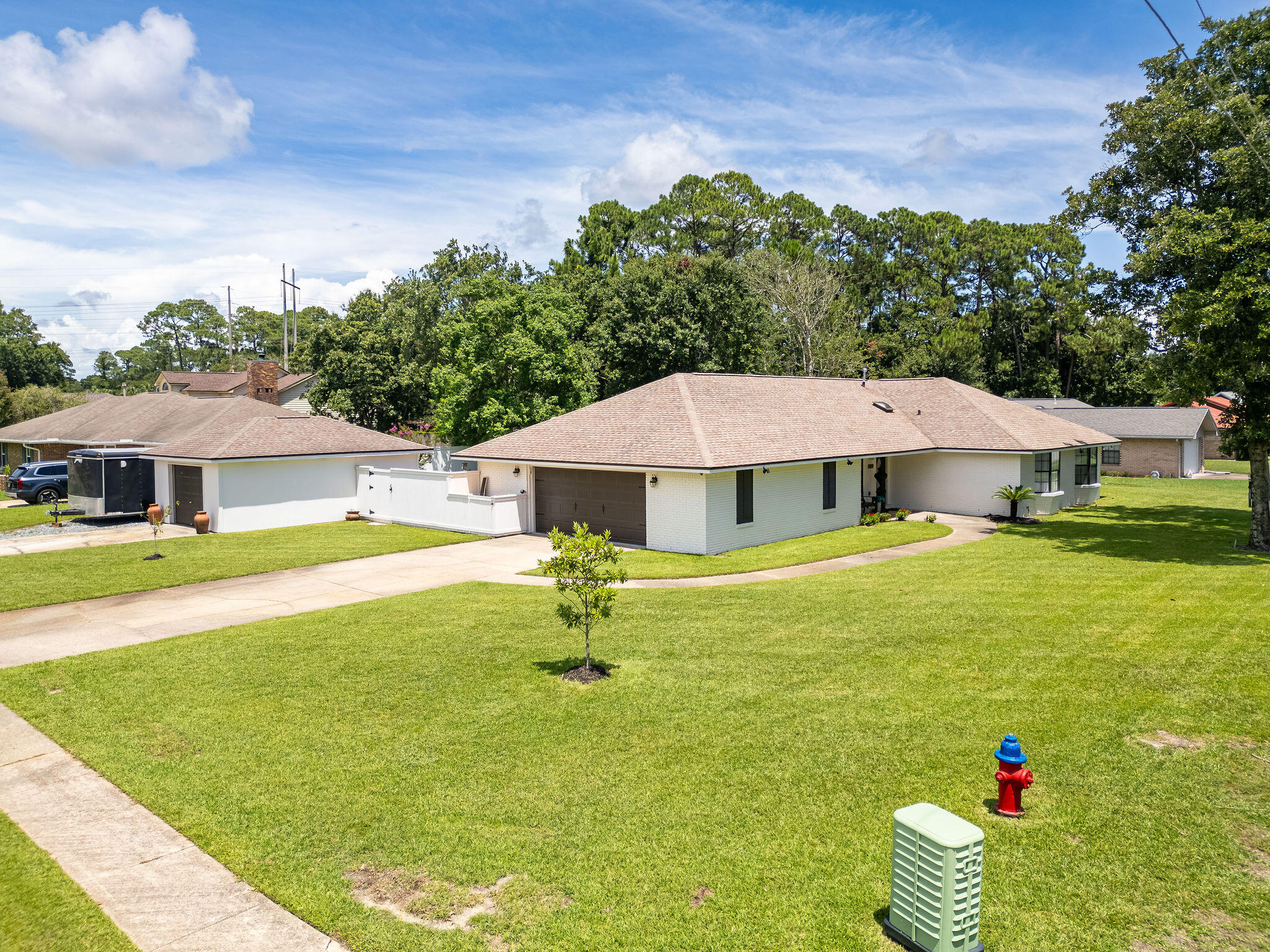 'Value for the Price' there is nothing this nice in Fort Walton Beach! Start with a very beautiful home built by the original builder of Overbrook for him and his family. It is loaded with high end finishes & has an additional detached garage and custom work shed with combined value for the two at $50,000.00. The property location is in the 'Heart of it All', but is distanced for privacy, has .41 of an acre lot, a well landscaped big fenced in back yard, and loads of parking space. The current owner has stepped up to spending over $56,700.00 to enhance the property which includes a new roof & hot water heater. Click on the photos to discover much, much more! Truly needs to be seen to be fully appreciated. So don't delay...come see it today...make it yours...and love it forever! New roof!