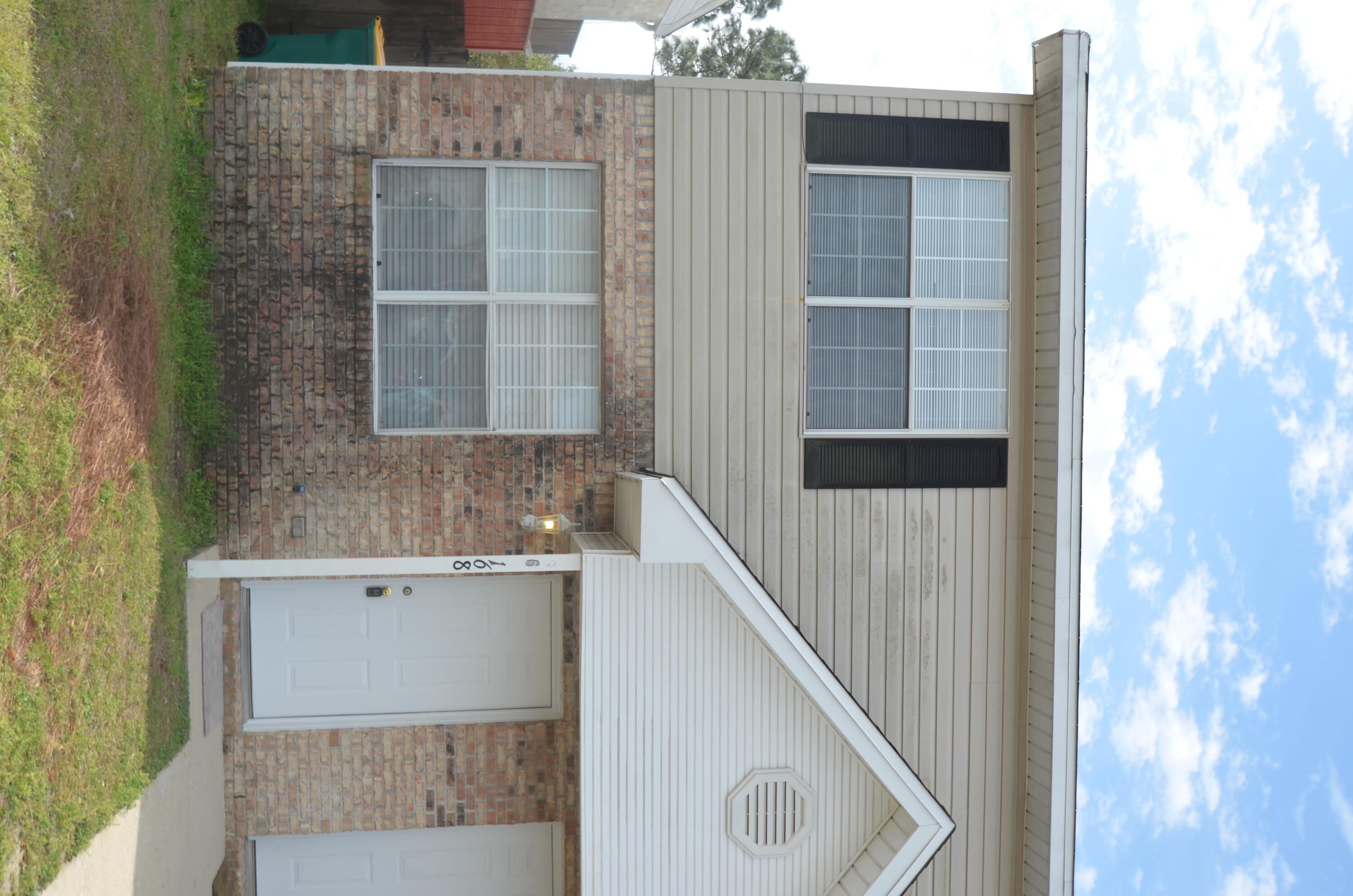 End unit and spacious. This well maintained townhome features all tile on the first level and carpets upstairs. Kitchen has plenty of cabinet space along with a pantry and built-in microwave. Relax on your covered back porch as the sun is setting. Sorry, no pets. *All Coastal Realty Services residents are enrolled in the Resident Benefits Package (RBP) which includes renters insurance, HVAC air filter delivery (for applicable properties) and our best-in-class resident rewards program and much more! More details upon application.*