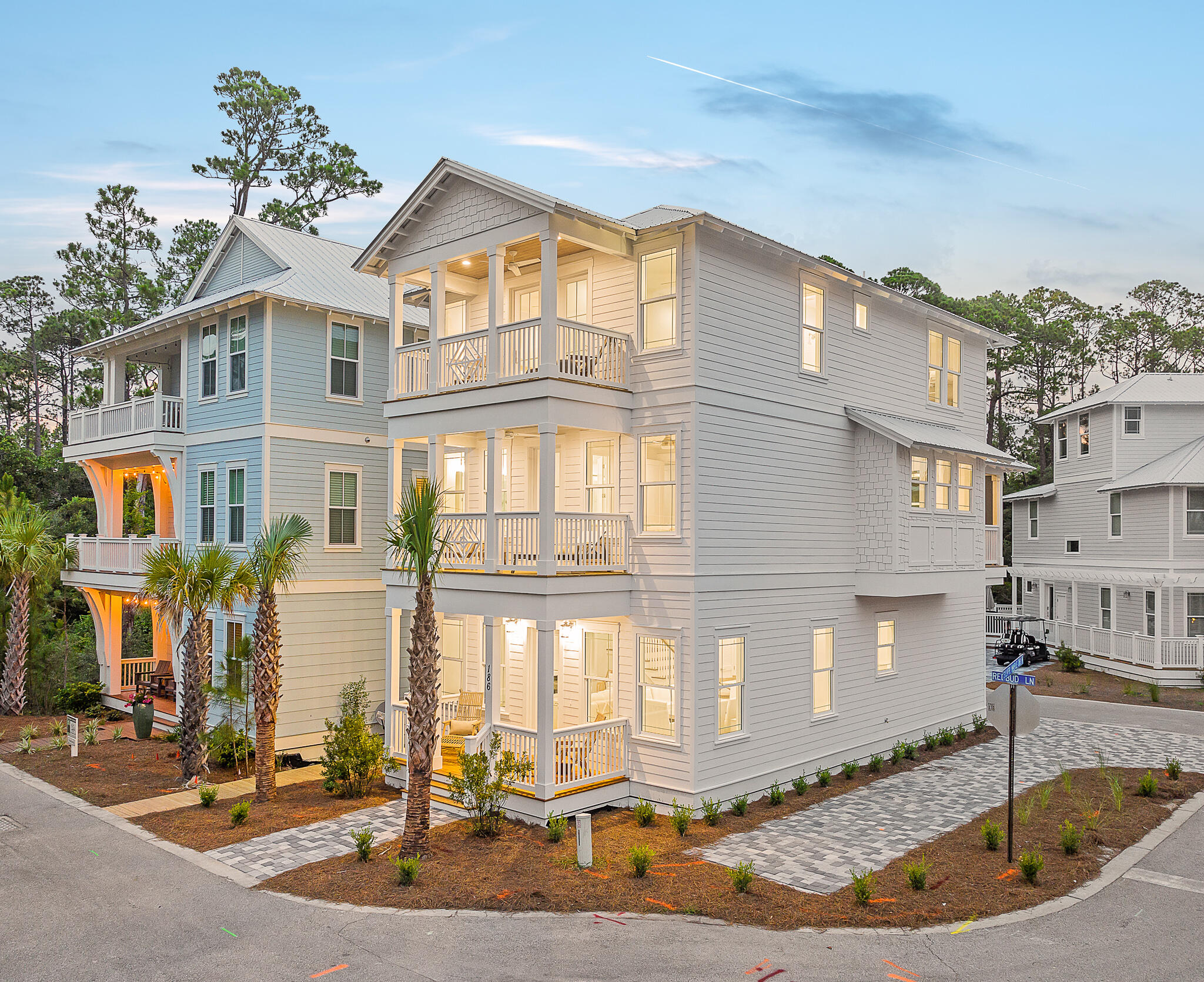 ''Five Porches'' is a completed new construction opportunity in Treetop Village on a corner lot with ample paved parking. Attractively positioned as a rental investment, primary, or secondary residence. Easily accessible and private with two gates one from 30A through Seacrest Beach and a second gate on Highway 98. Thoughtfully curated with coastal inspiration featuring five bedrooms and four and a half baths. Highlights include: an open concept with two living rooms spaces, a game room, and bunk room behind a three-story facade. Five porches provides multiple areas for entertaining inside and out including a first floor living room with a linear gas fireplace, and an additional area for gathering on the second level inside and out with a screened in porch and media wall. Featuring high-end finishes including: shiplap, raised ceilings with crown molding, engineered hardwood floors, custom closets,
and quartzite and ceramic tile enhancing all of the baths. The master ensuite bath features veined tile and a deep stand alone tub. There is a king bed on the first level with ensuite bath and private entrance. The primary suite has complete privacy on the second level with an ensuite luxurious bath and private balcony. The third level offers three additional bedrooms with two king beds and four full beds in the bunk room. Four bedrooms have balconies for additional privacy and space.
Double pane windows flood each room with natural light while the high-tech air to a heat pump makes this an eco-friendly home to operate. A fully equipped open-plan kitchen, LG stainless steel appliances enhance the open kitchen with quartz counters and a sizable living and dining area are perfect for entertaining in style. Conveniently located close to Scenic Highway 30A, if you prefer swimming and sunset strolls beside the beautiful Gulf of Mexico the deeded beach access is easily reached by tram. Closer to home, take a dip in the pristine community pool which is 170' and enjoy the outdoor shower at Five Porches before before stepping out for the evening. There is also a gas hookup outside if you prefer to grill at home. Shopping, cafe's, and amenities nearby on 30Avenue complete your Florida lifestyle. All furnishings, artwork, and housewares convey.