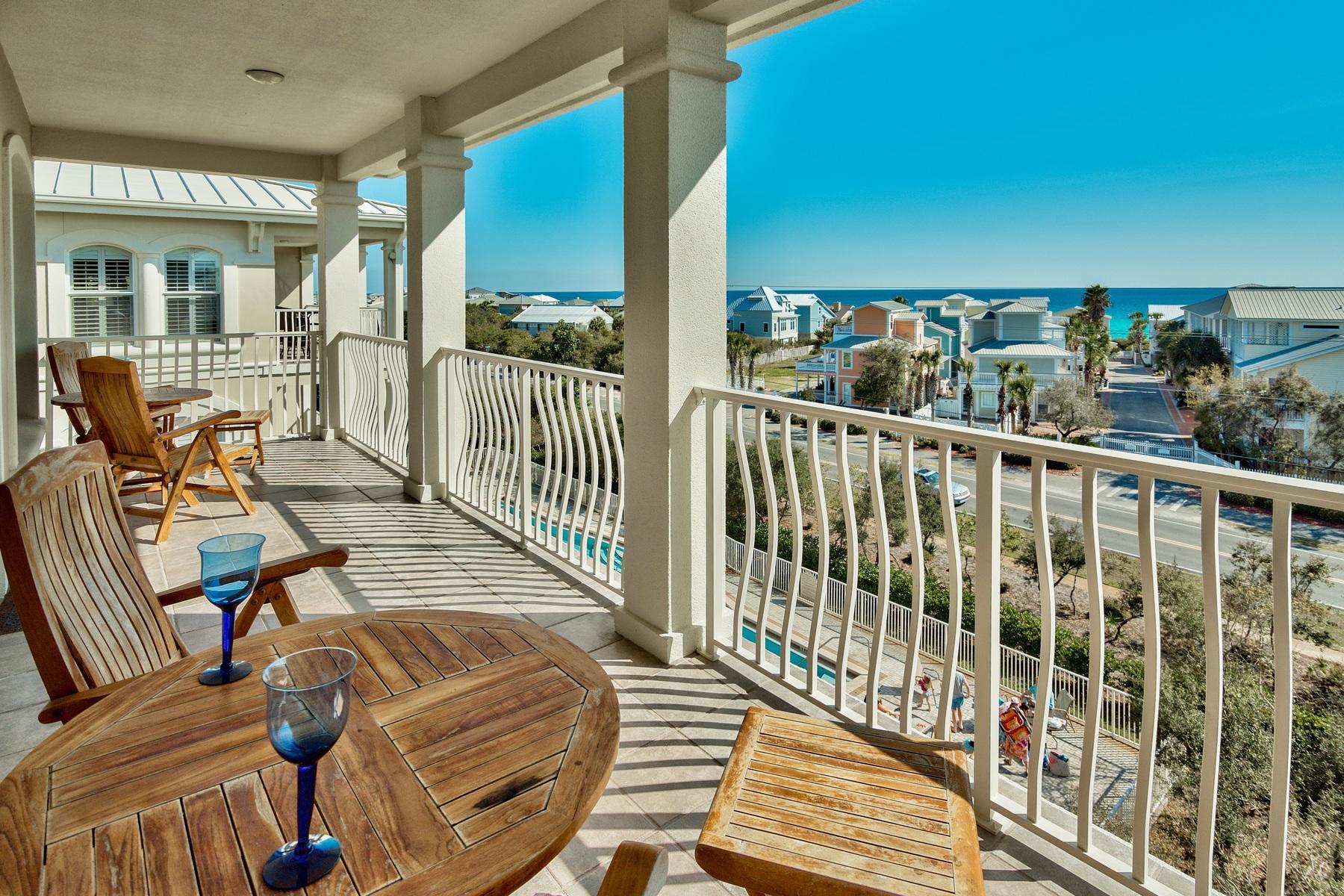 You have found the perfect paradise destination in this beautifully decorated Villa located in the heart of beautiful Seagrove Beach. Enjoy the privacy of a gated community with the convenience of great restaurants and attractions on 30A just minutes from your door. This four bedroom, three bath condominium is on the top, fourth floor with easy elevator access. Inside you will find a spacious kitchen with beautiful granite counter tops, stainless steel appliances and breakfast bar. With gulf views from the living, dining and kitchen area, this is the perfect place to entertain family and friends. Step off of the living area and relax on the sprawling balcony with breathtaking views. All four, bedrooms are bright and generously sized, accommodating a king, two queens and two double beds! Just a short walk to the  beach with deeded access, enjoy the sand and surf and then take a swim in the beautiful community pool! With the ideal location and incredible accommodations, this is the perfect vacation home on 30A.
