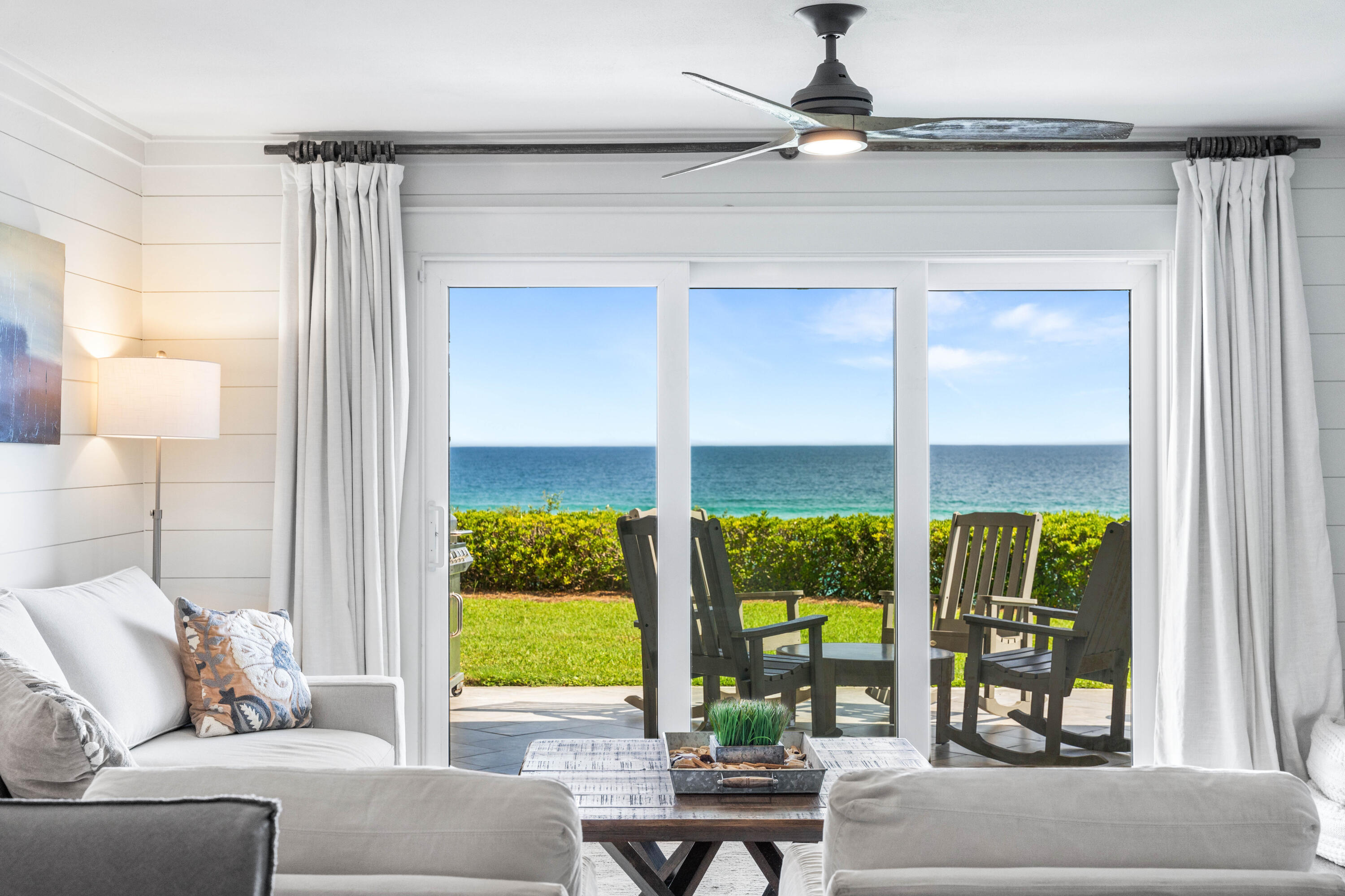 Newly renovated Gulf Front townhome with DEDICATED BEACH ACCESS and phenomenal unobstructed gulf views! Sea Shadows 4 is nestled in Seacrest, within close proximity to neighboring communities of Rosemary Beach, Alys Beach and WaterSound. Located South of 30A, this Gulf Front Townhome features shiplap accent walls, LVP flooring throughout, quartz countertops and jaw dropping views. The first floor features an open floor plan with the kitchen, dining and living areas all overlooking the endless view of the Gulf. The Primary Bedroom is Gulf Front. Being on the 2nd floor, it has even more breathtaking views of the Gulf and beach. The primary bedroom features it's own private balcony with sitting area and an ensuite bath.  Upstairs you'll also find a guest bedroom and a full bathroom with a shower/tub combo. Step out the door from the living room and the steps to the beach are just right in front of you, creating ease of access for you and your guests, to and from the beach. An outdoor shower is conveniently located on the back patio for a quick rinse before heading back inside. Offered fully furnished with proven rental capabilities, this turnkey unit is ready to be your own vacation rental, second home or even full time residence!