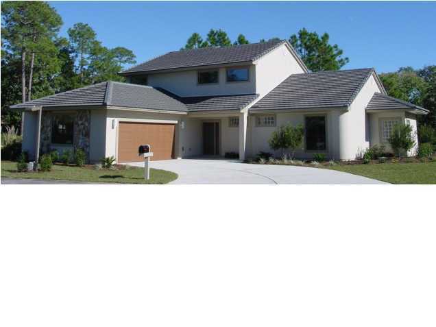 Check out this great looking home located on a beautiful golf course and lakefront lot. Stucco exterior, tile roof, and a fabulous floor plan! Great room with built in media center,gas fireplace, formal dining room, large kitchen with granite counter tops and breakfest nook overlooking the lake.First floor master suite, with corner whirlpool tub and seperate walk-in shower, huge walk-in closet and separate vanities plus additional bedroom with full bath.Second story has 2- large bedrooms full bath w/ double vanities and large loft area over looking great room, perfect computer room or play area.