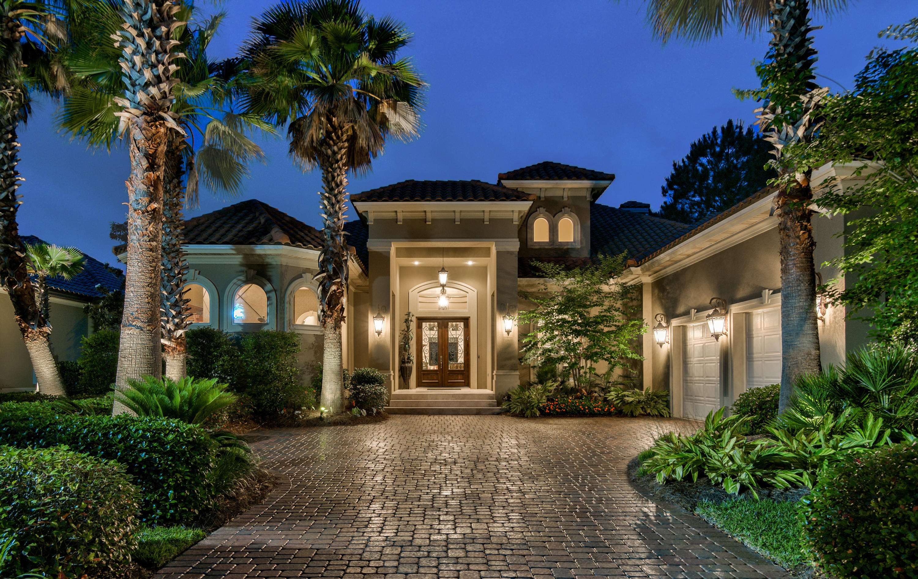 IF YOU ARE LOOKING FOR THAT COASTAL FEEL, OPEN FLOOR PLAN, GOLF COURSE VIEWS AND INCREDIBLE OUTDOOR COOKING & ENTERTAINING, LOOK NO FURTHER! Recently updated, this 4+ bedroom with 5 baths, custom built home has sweeping south-western views overlooking the 2nd & 3rd holes on the Burnt Pine golf course. The multi-panel sliding glass doors brings the indoor and outdoor living spaces together for entertaining as you enjoy the screened-in patio and pool with waterfalls and spa. Updates include: new appliances in the outdoor summer kitchen (ice maker, refrigerator, warming drawer, pizza oven and a Twin Eagles BBQ), new appliances in the kitchen (Bosch refrigerator, Wolf gas stove), and the large granite breakfast and entertaining island all make this a true gourmet chefs delight. Other update