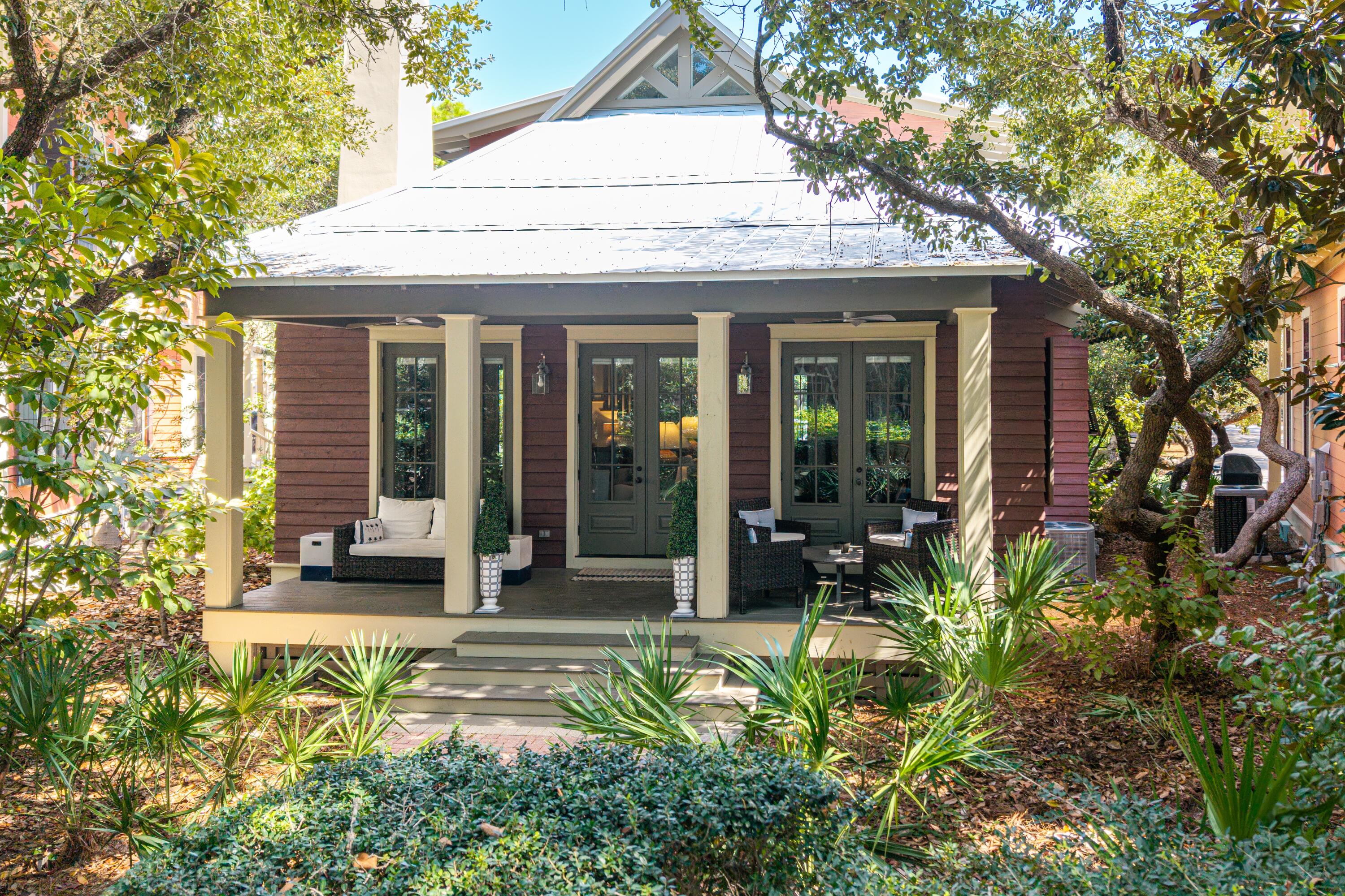 IMPROVED PRICE + PRIME WATERCOLOR LOCATION!

Now offered at an attractive new price, this exceptional cottage is perfectly positioned along Crimson Park in the highly sought-after Park District of Phase 1--one of the most desirable locations in WaterColor. Known for its charming, rose-colored homes and storybook setting, this unique streetscape creates a truly unforgettable coastal experience.

Step inside to a beautifully curated retreat reminiscent of a Serena & Lily showcase, where relaxed coastal elegance meets refined design. With over 1,700 square feet, this two-bedroom plus bunk room, two-and-a-half bath home is thoughtfully designed for both entertaining and everyday comfort. Soaring cathedral and beamed ceilings, oversized windows, and multiple French doors fill the home with natural light while showcasing picturesque views of Crimson Park and the Rose Garden Mews.

The first-floor owner's suite offers a spa-like bath with dual vanities and opens to a private screened porch--perfect for morning coffee or unwinding in the evening. A charming bunk room adds flexibility, while the spacious upstairs loft with two queen beds lives like an additional suite, ideal for hosting guests.

Offered fully furnished with a six-seat golf cart, this home is truly turn-key. Enjoy an easy stroll to the Boathouse pool, WaterColor Beach Club, and the Gulf, along with access to world-class amenities including multiple pools, tennis and pickleball courts, a fitness center, scenic trails, and Western Lake for paddleboarding and kayaking.

Investment Opportunity:
Strong rental performance with $133,968 in gross revenue over the past two years and $136,547 already on the books for this year.

With its improved price and unbeatable location, this is a rare opportunity to own in one of 30A's most coveted communities.