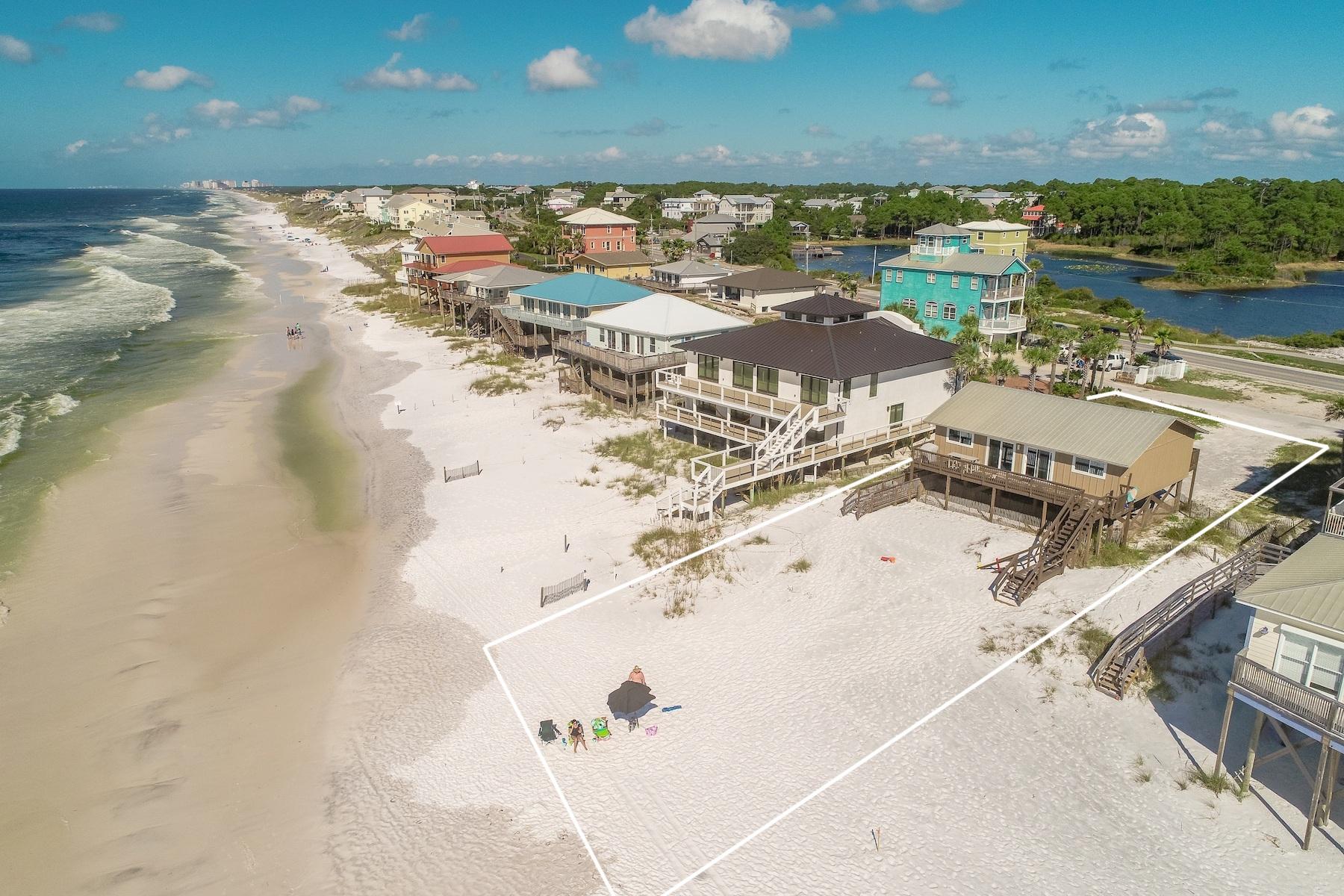 Extraordinary gulf views are well defined from this old Florida style beach retreat prominently situated on the largest homesite off Fort Panic, south of Scenic Highway 30A offering 75' of pristine beach frontage. This property is currently an impressive income producing home with consistent historic short term rental performance derived by a functional open living floorpan juxtaposed premium gulf front positioning. This property conveys with ready-to-go DEP approved building plans (pending full approval from Walton County building department, which is currently in progress) allowing for a rare redevelopment opportunity to maximize value in this premium location. Fort Panic is located on the West end of 30A close to world class restaurants, shopping, premier golf courses and local entertainment.