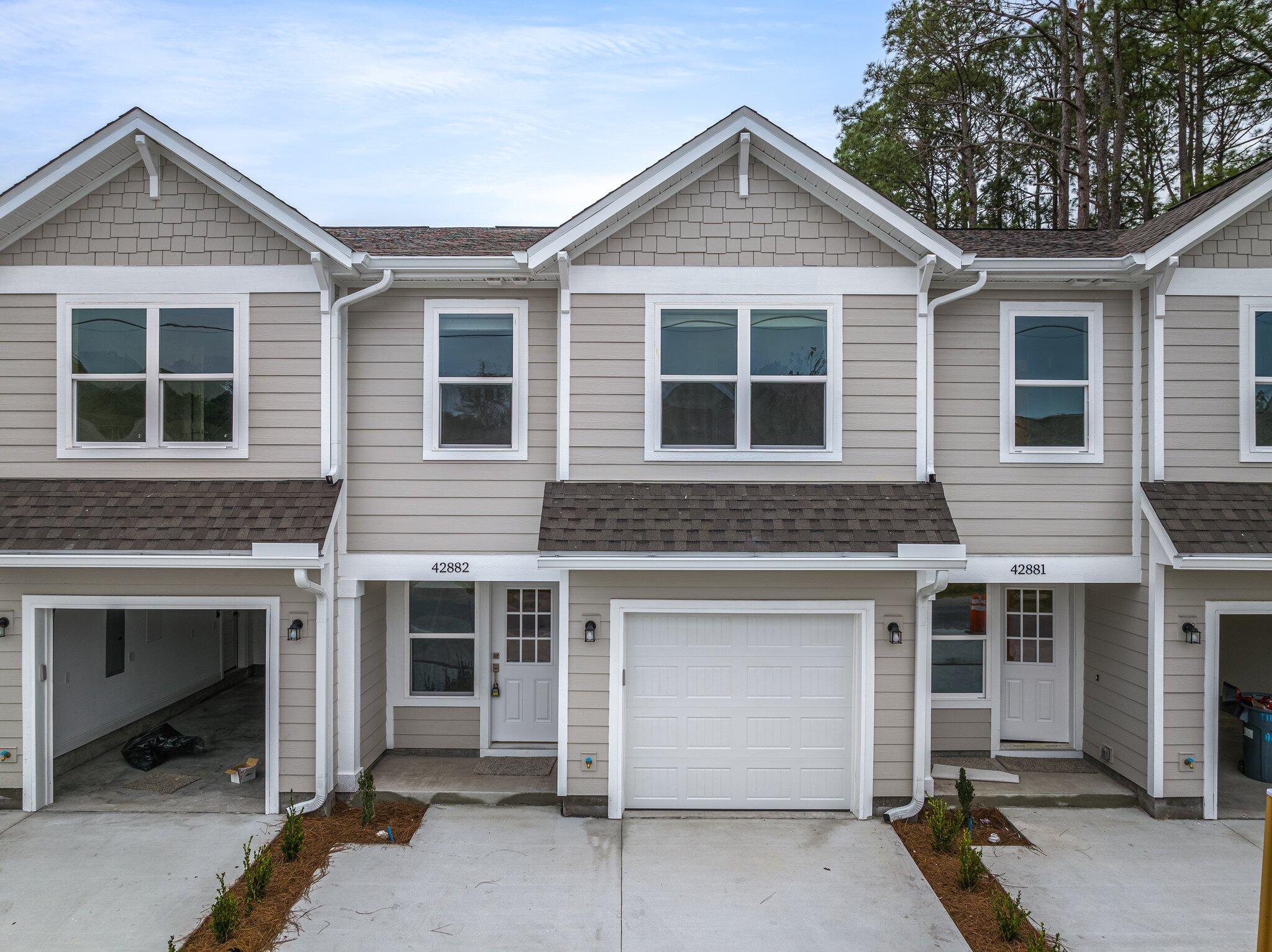 DO NOT MISS YOUR CHANCE to get into a BRAND NEW townhome in the heart of BLUEWATER BAY! Upgrades including QUATRZ countertops, STAINLESS STEEL appliances, White SHAKER cabinets throughout and VAULTED ceilings in the master. SUBWAY tile backsplash and master SHOWER. Plenty of storage with an oversized WALK IN master closet and a one car GARAGE. The main floor will be LVP with carpet on the stairs and upstairs. Call your favorite agent today!