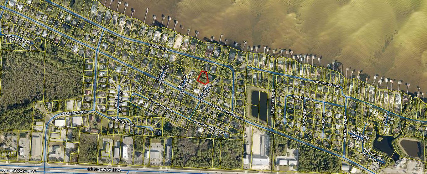 This beautiful lot with potential for Bay views makes it a perfect homesite for full time residents or second homeowners. Perfectly located near the shores of the Choctawhatchee Bay, the cul de sac is perfect for families, while still being close to shopping, golf courses, restaurants, and everything Sandestin and Destin have to offer. Golf cart to the beach or the Seascape Town Centre! High and dry lot located in an X flood zone. There are no HOA fees and the tap fees are due. Buyer to perform their own due diligence. Survey is available.