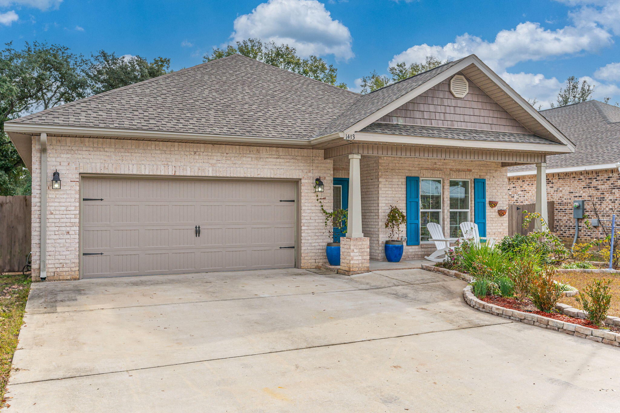 Welcome to 1413 Cedar Street, a charming 3 yr old home in Niceville, Florida. This residence boasts 5 bedrooms and 2.5 bathrooms, offering an ideal space for creating memories with your loved ones. With a spacious 2,458 sq ft of living space and a 2-car garage, this home combines modern comforts and Southern charm seamlessly. The kitchen is well-appointed with granite countertops, tiled backsplash, soft close shaker cabinetry, and a sleek slate appliance finish. LVP flooring graces the entirety of the home, adding both style and durability. This custom home is adorned with crown molding, trey ceilings, and Satin Nickel hardware, providing a contemporary touch. You'll also enjoy lower electric bills due to additional insulation added over the home and garage, as well as (click more) continuous hot water thanks to the tankless hot water heater! Move in now - it's the perfect place to gather with family and friends to express gratitude and create lasting memories!