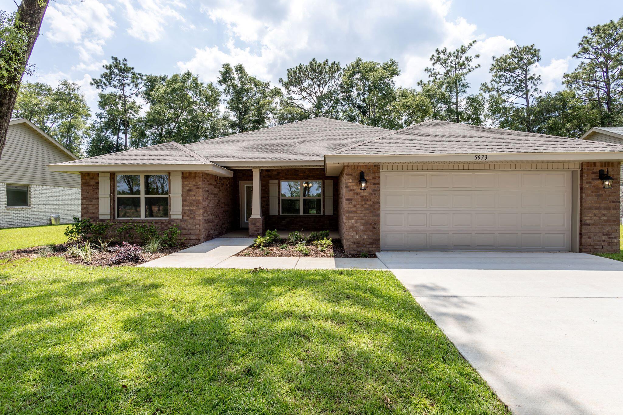 Traditional 4 sided brick with sprinklers too! This home offers 4 bedrooms and 3 full bathrooms. The kitchen and baths have been upgraded with granite and the master bath has a large walk in shower in lieu of a tub. Floors are upgraded with LVP and carpet is only in bedrooms. Large family? Frequent guests for dinner? No problem. This home has a formal ding room as well as a dining area off the kitchen. Closets are large with the master having a walk in. This home sits on a premium lot and comes fully sodded and professionally landscaped. The subdivision is well lit with street lamps. North Crestview offers many dining choices, shopping and A Rated schools. This home comes with a 10 yr. Bonded Builders warranty.
