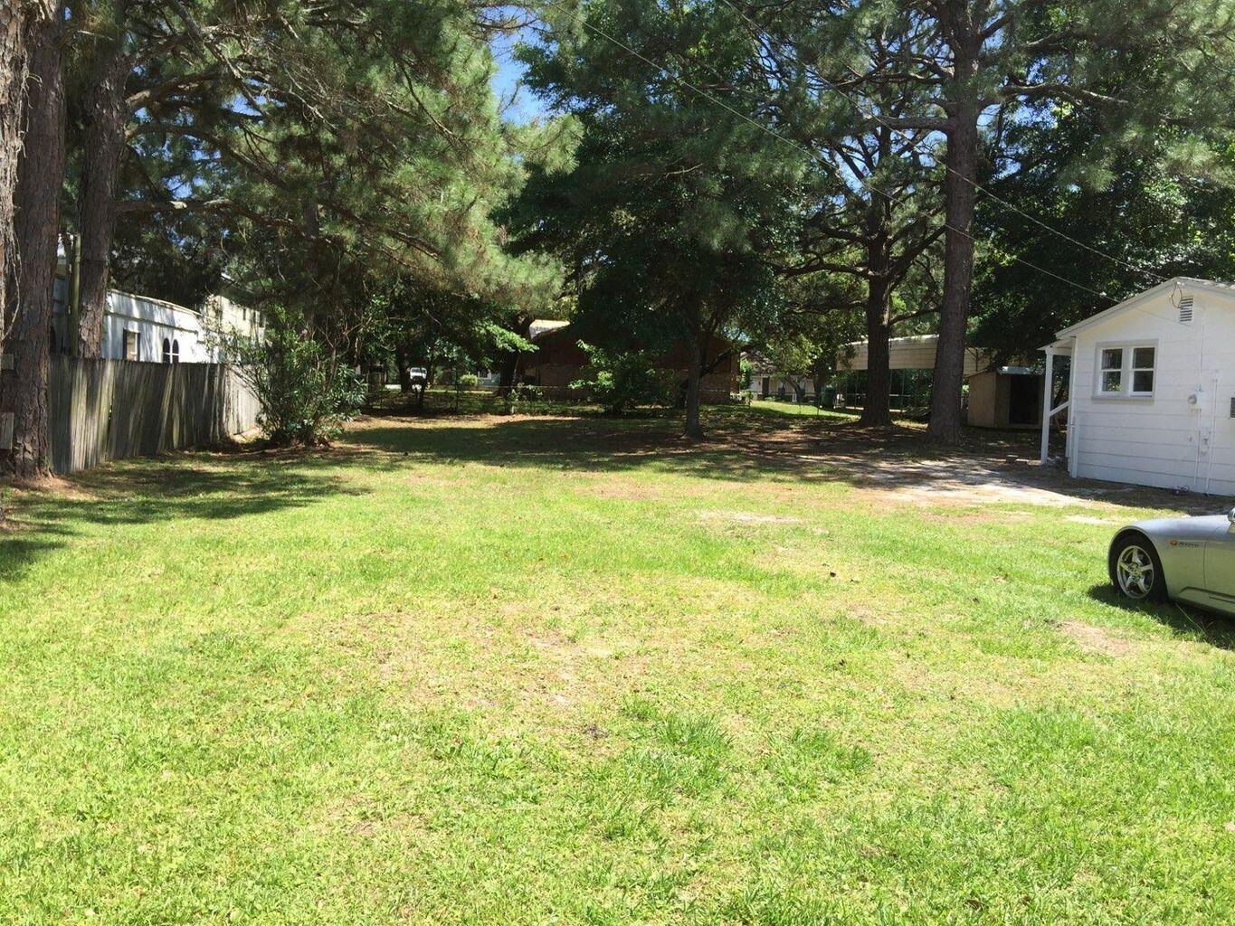Vacation here no more! Make Destin your new home; affordable and near the bay. No HOA and a short walk to the bay. 2 parcels to build on one and/or renovate the cottage. (Seller will consider selling parcels separately.) Cottage is a fixer upper that will easily generate rental income as it has for years. Prime opportunity for short term rentals. Need more parking spaces? This long lot allows for ample parking. Welcome to The Emerald Coast.