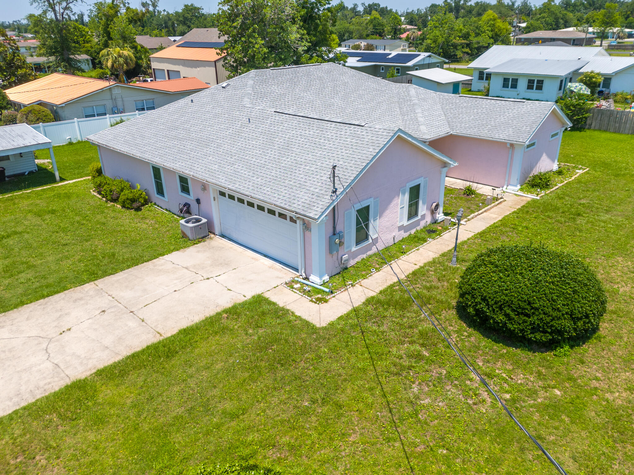 This magnificent home is centrally located in the Hiland Park area and convenient to schools and shopping.  With approximately 1/2 acre, there is plenty of room for additional parking, hosting back yard bbqs, add a pool, etc.   You are greeted at the entrance with a nice courtyard and covered front porch.  The open floor layout provides a spacious living area with a split bedroom plan. The shed has room to store yard equipment, etc. and the workshop provides a great space for the hobby enthusiast.  Enjoy the outdoors as you relax on the massive 26x12 covered back porch which has access from both the living room and master bedroom.  The large master ensuite provides separate his and her vanities. Tyndall Air Force Base is located about 11 1/2 miles away, the public beach at Rick Seltzer Park 12 miles, and Pier Park is about 16 miles.  This home is the perfect opportunity for anyone looking to settle down in Panama City.  If measurements deemed important, please verify.