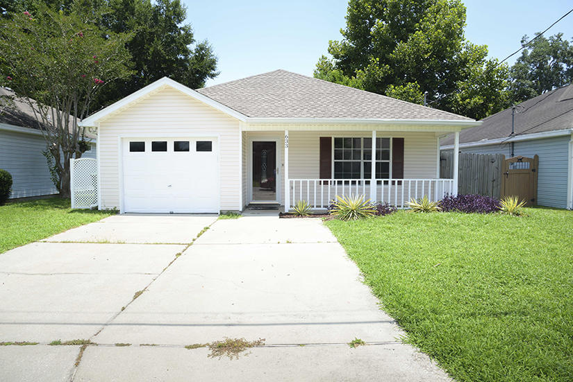 Cute mid town location, close to both bases! No carpet! All flooring is tile or laminate. Kitchen has granite counters and tile backsplash. Privacy fenced back yard with patio. No smoking inside home or garage.