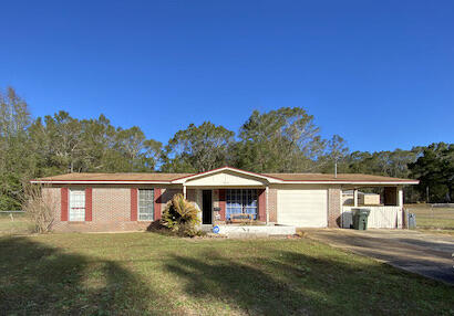 This large home rests on over 1 acre and is in the heart of Milton. Home's addition adds to the square footage and creates a total of 4 bedrooms and 2 baths. This property needs work and will not qualify for financing. Repairs will certainly include wiring, roof, interior structures, but when rehabbed, this would make a great home in a great location. Only cash or rehab loans will be considered on this home. Call today!